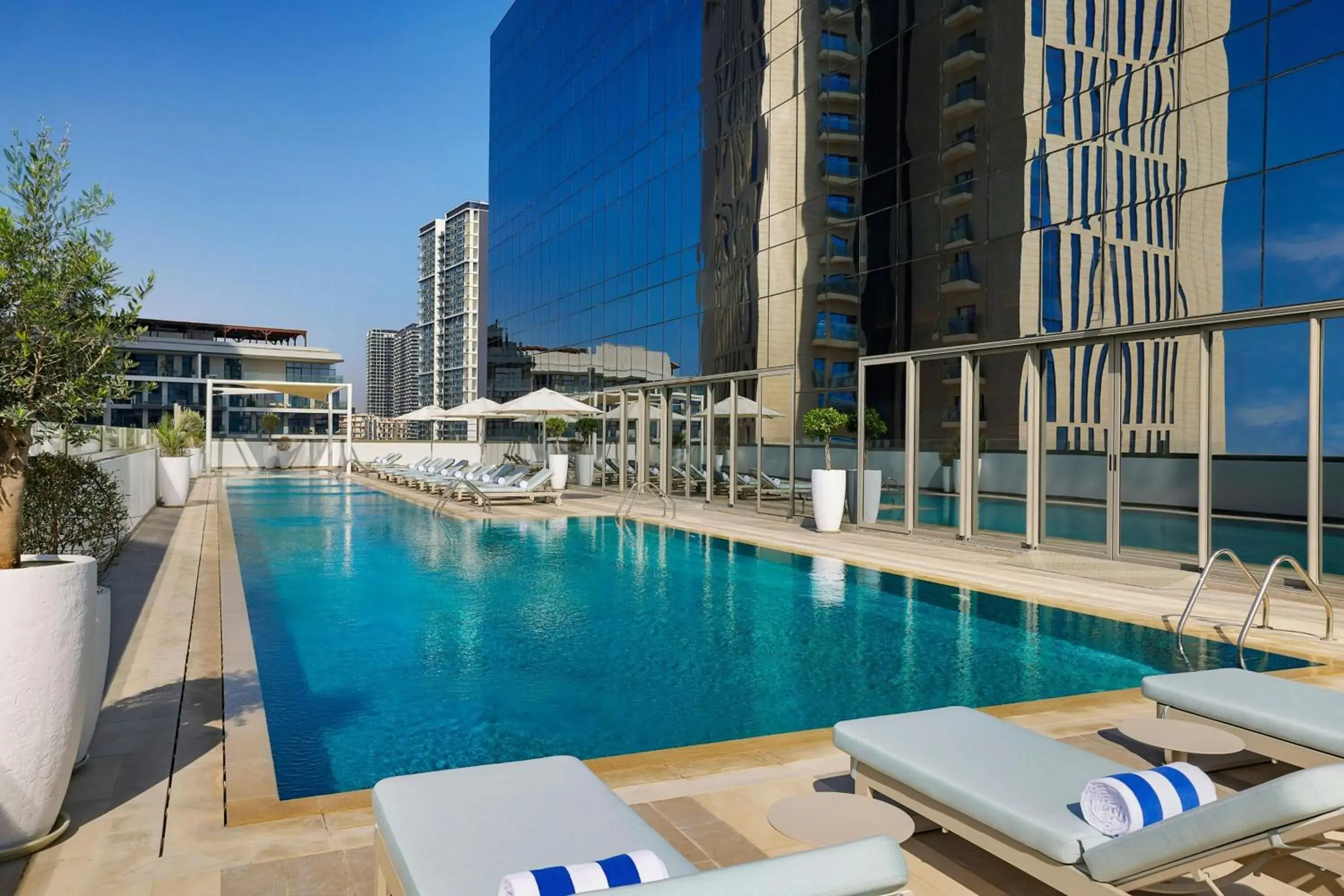 Swimming pool in Hotel Local Dubai, Jumeirah Village Triangle, Autograph Collection Swimming pool in Hotel Local Dubai, Jumeirah Village Triangle, Autograph Collection
