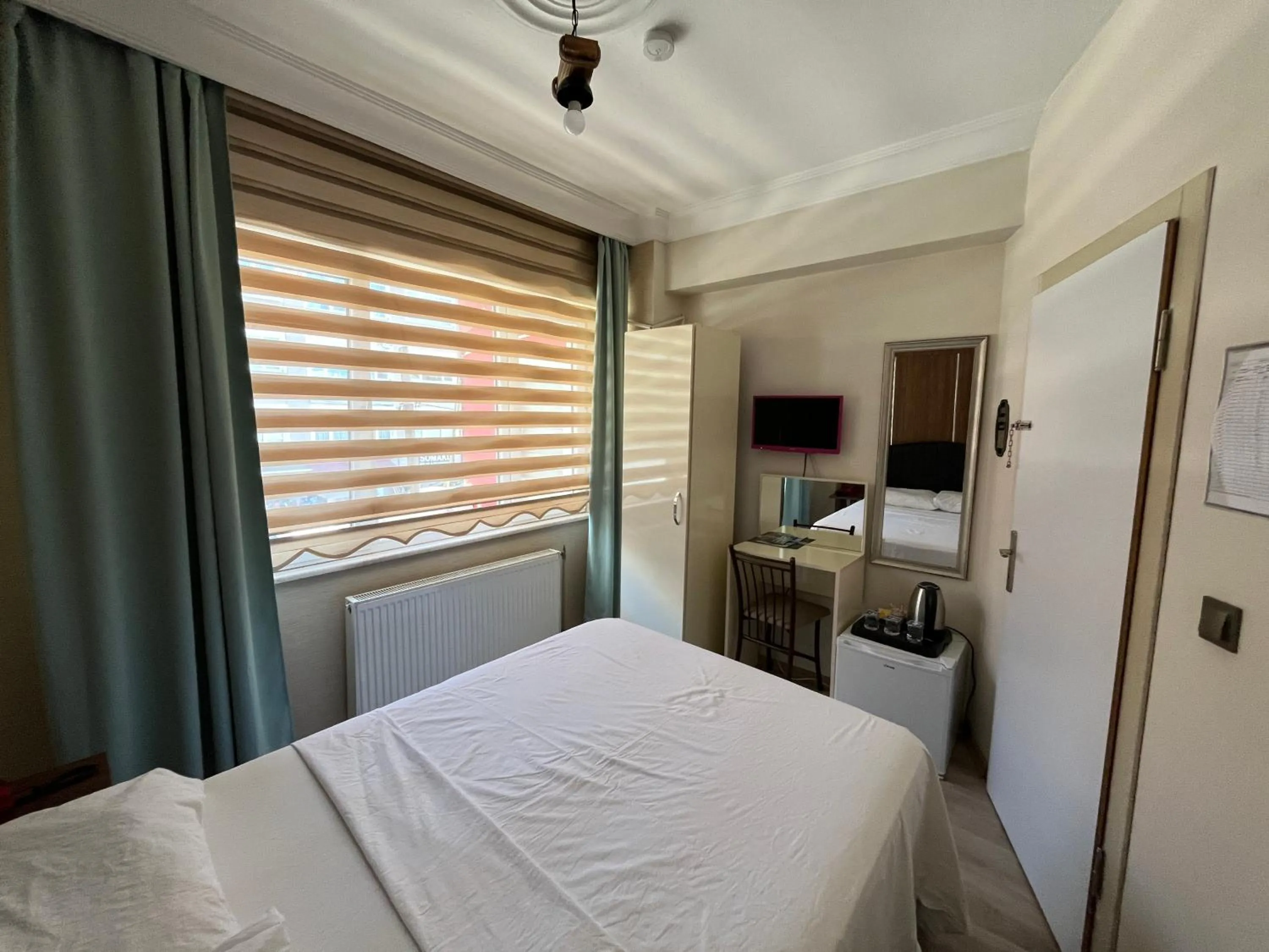 Bed in Rustic Pansiyon