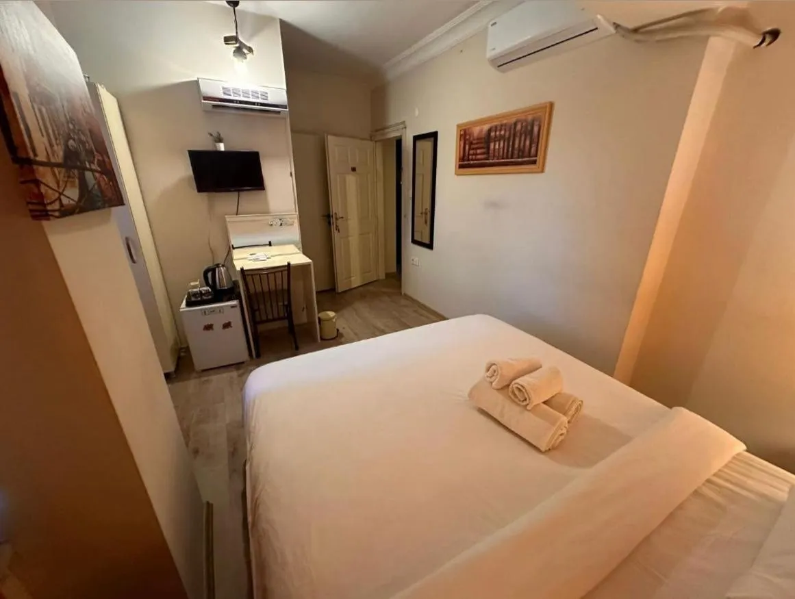 Bed in Rustic Pansiyon