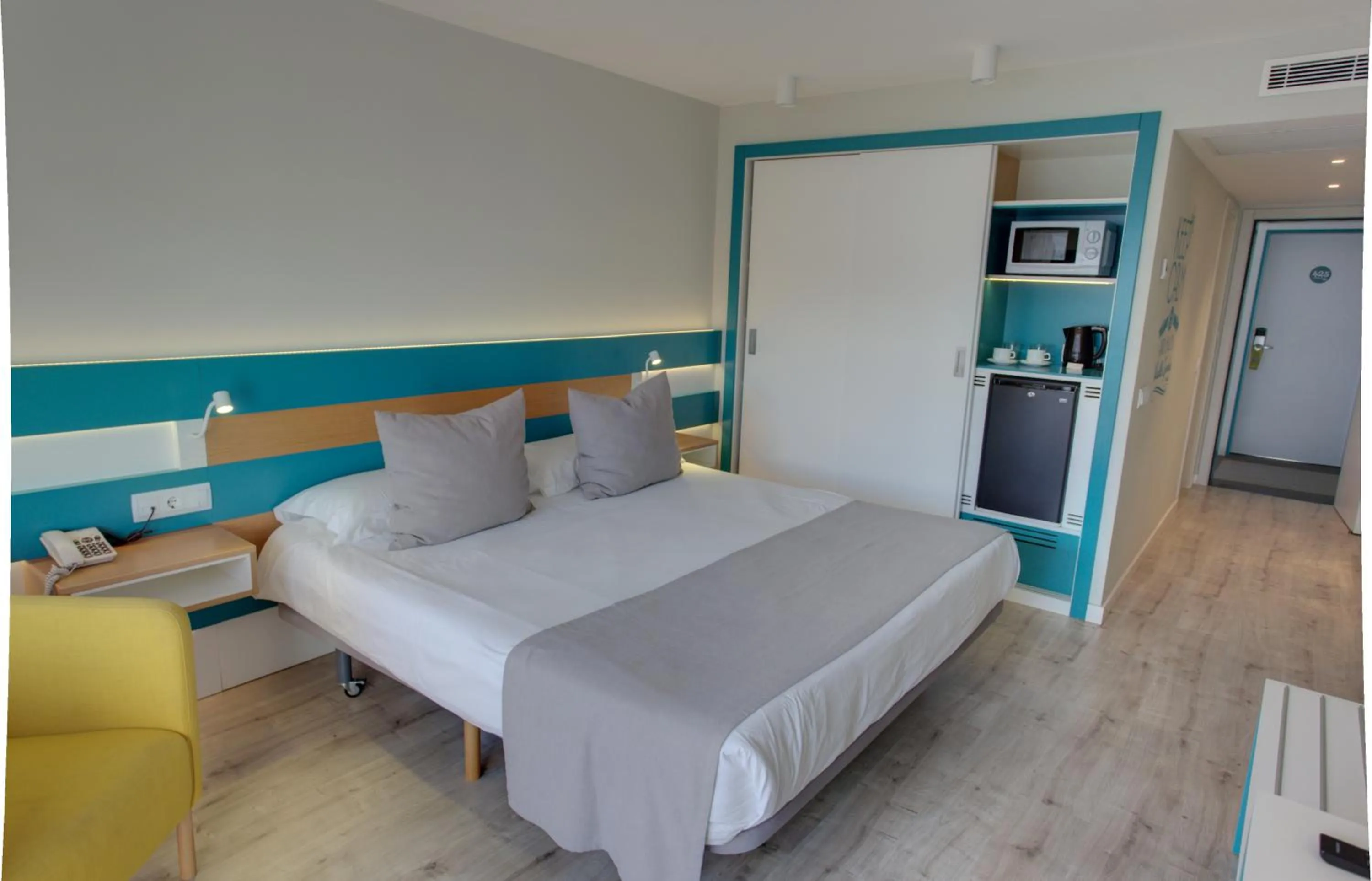 Kitchen or kitchenette, Bed in Vanilla Garden Boutique Hotel - Adults Only