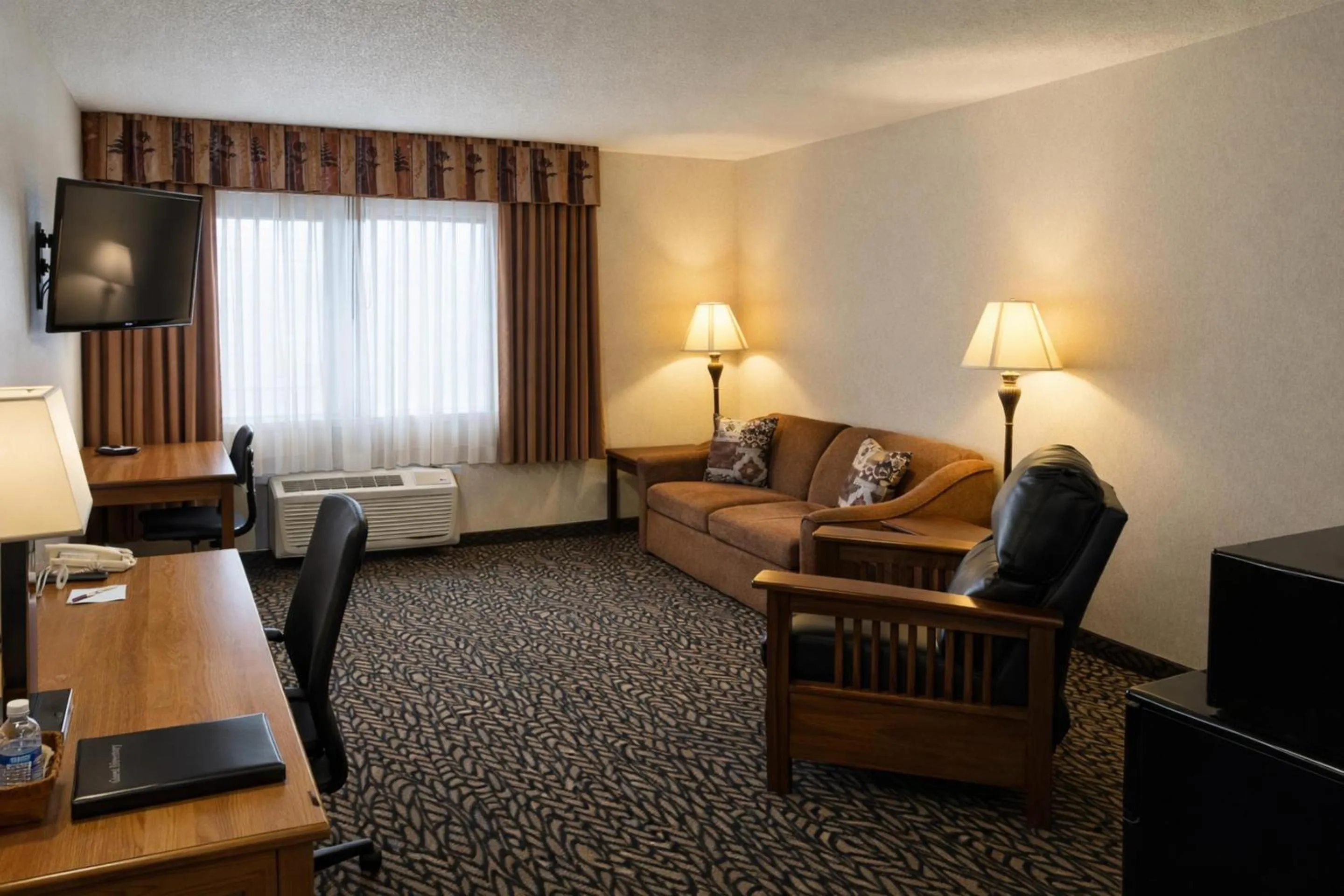 Bedroom, Bed in Fireside Inn and Suites