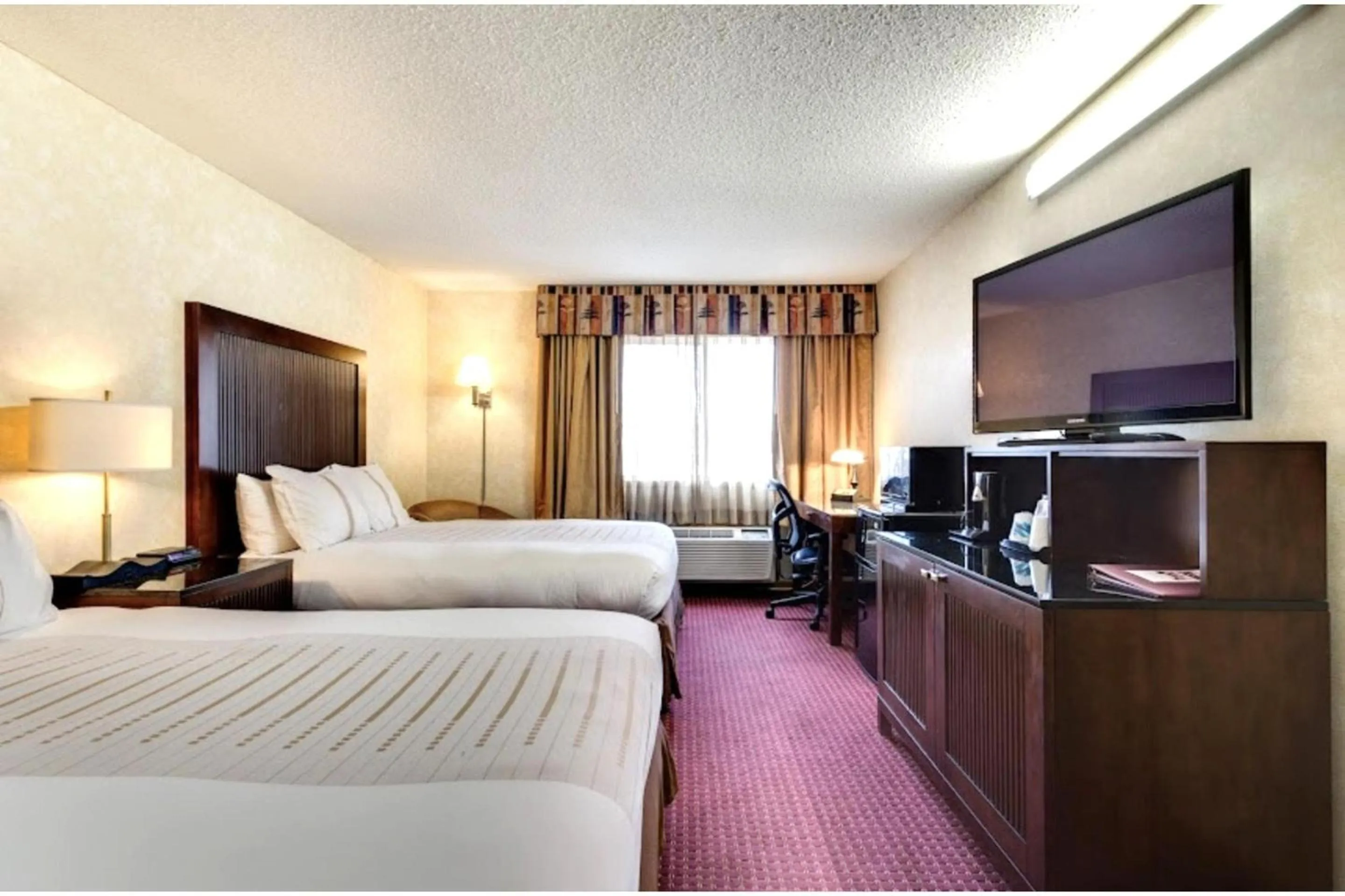 Bedroom, Bed in Fireside Inn and Suites