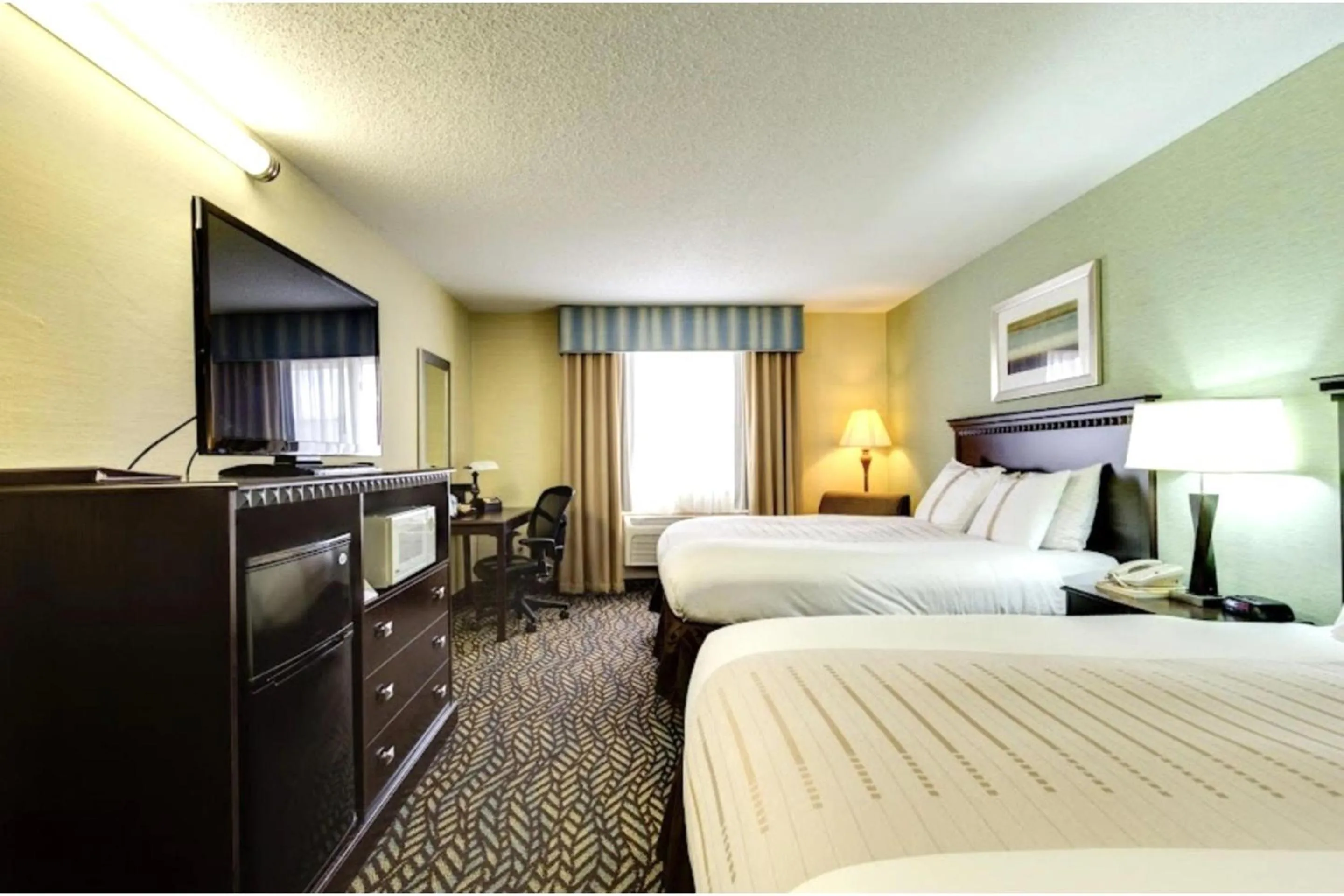 Bedroom, Bed in Fireside Inn and Suites