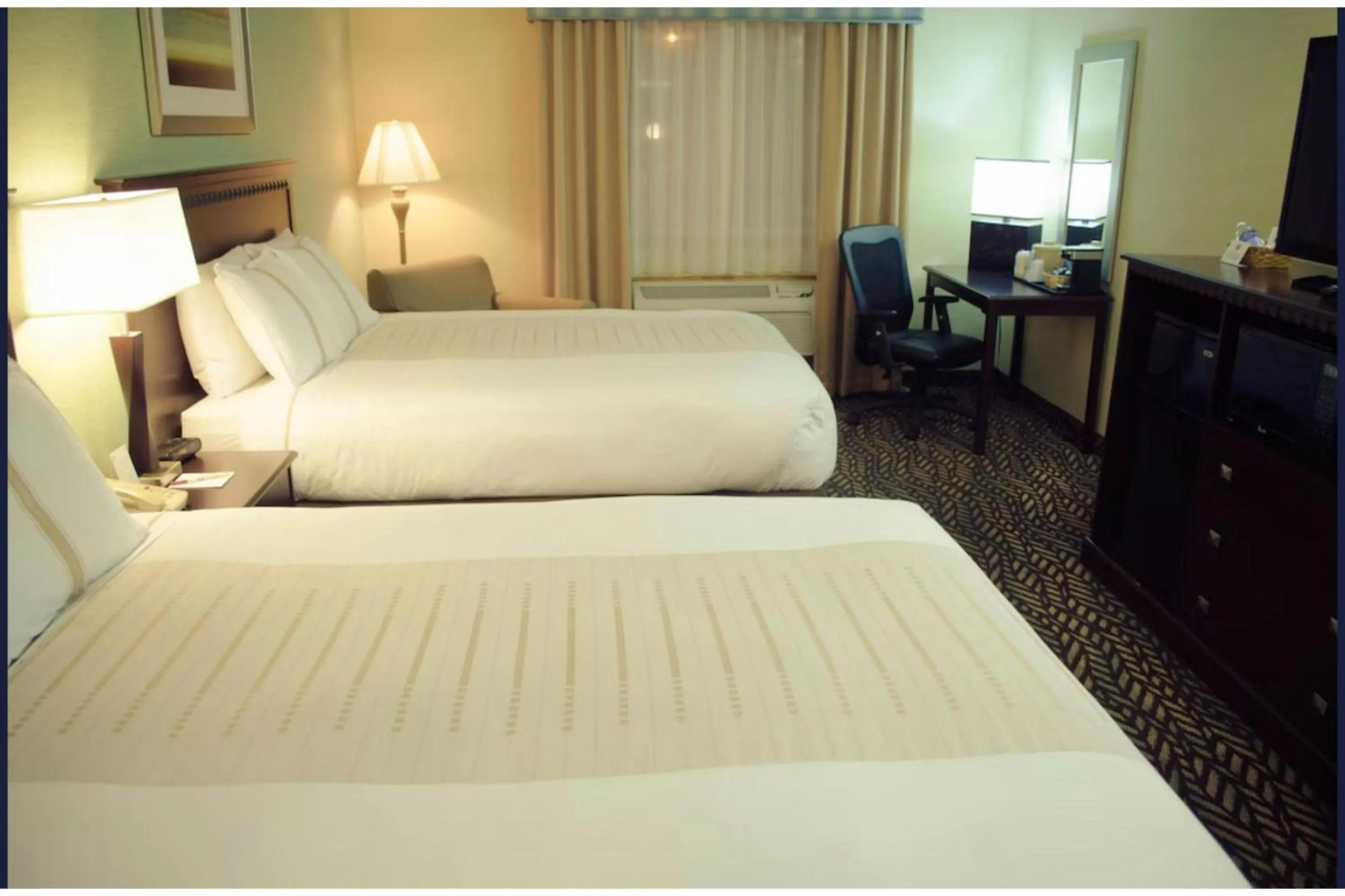 Bedroom, Bed in Fireside Inn and Suites