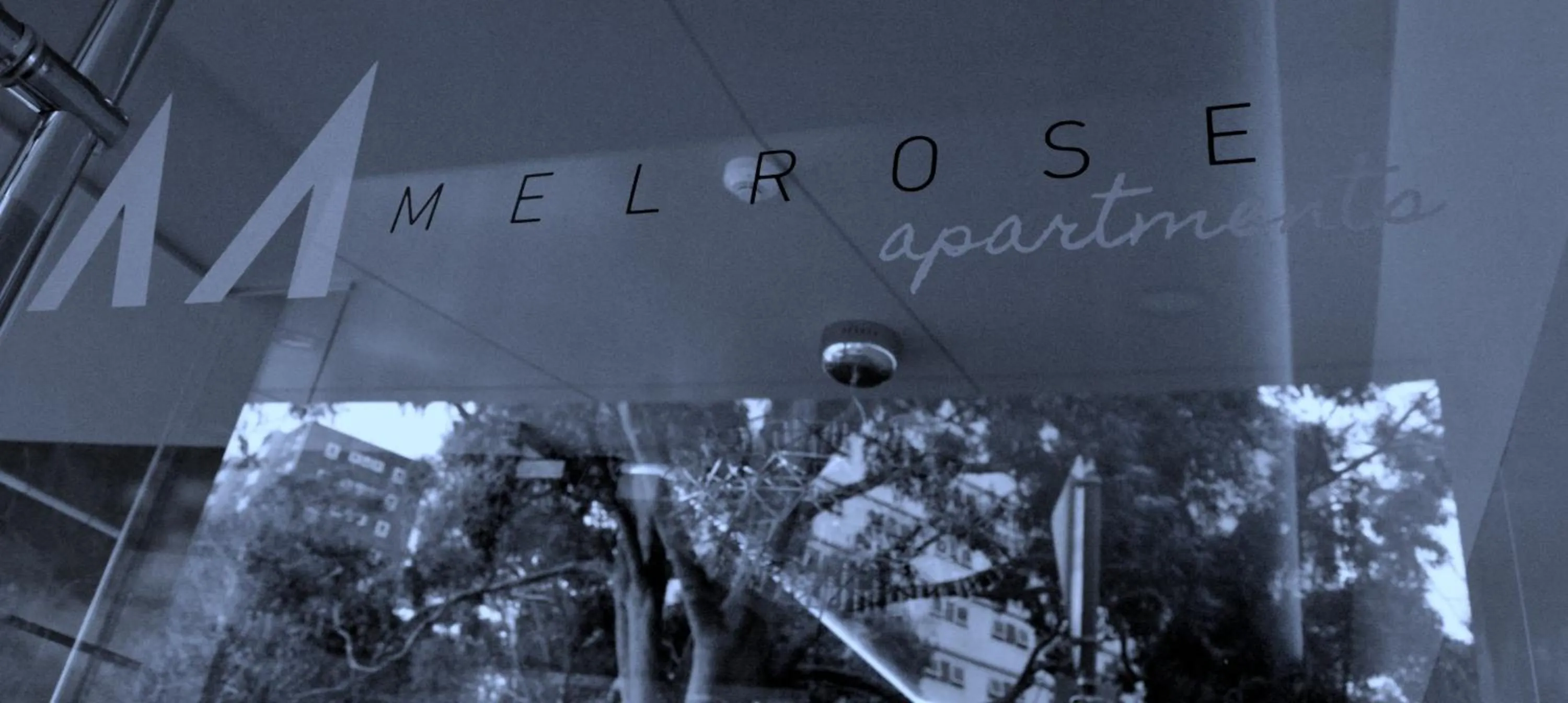 Property logo or sign in Melrose Apartments