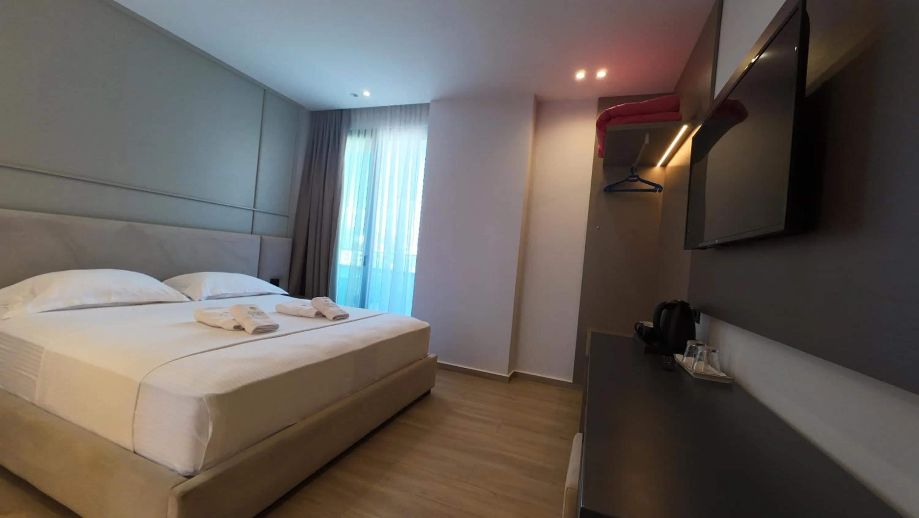 TV and multimedia, Bed in Hotel Boutique Onix