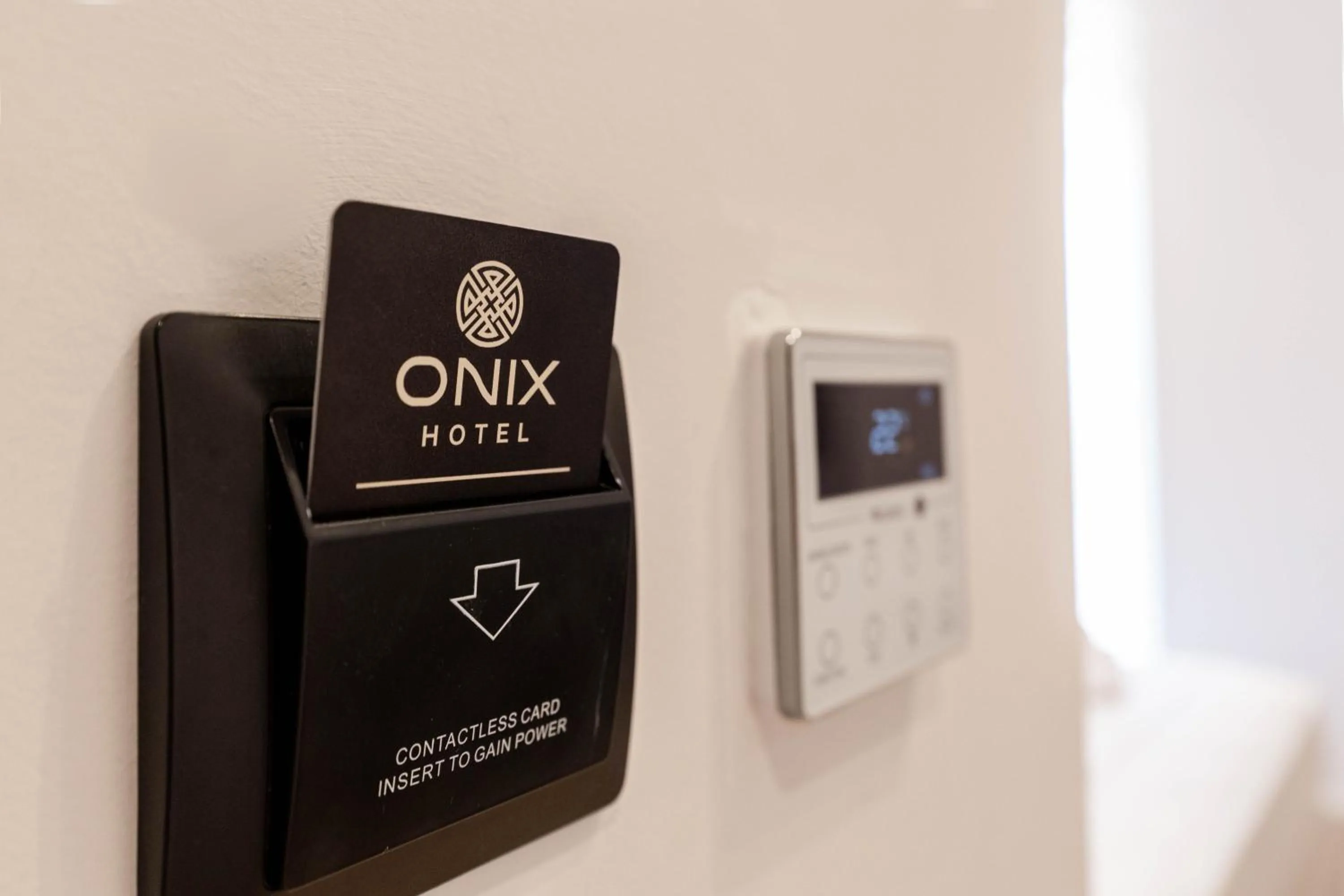 Property logo or sign in Hotel Boutique Onix