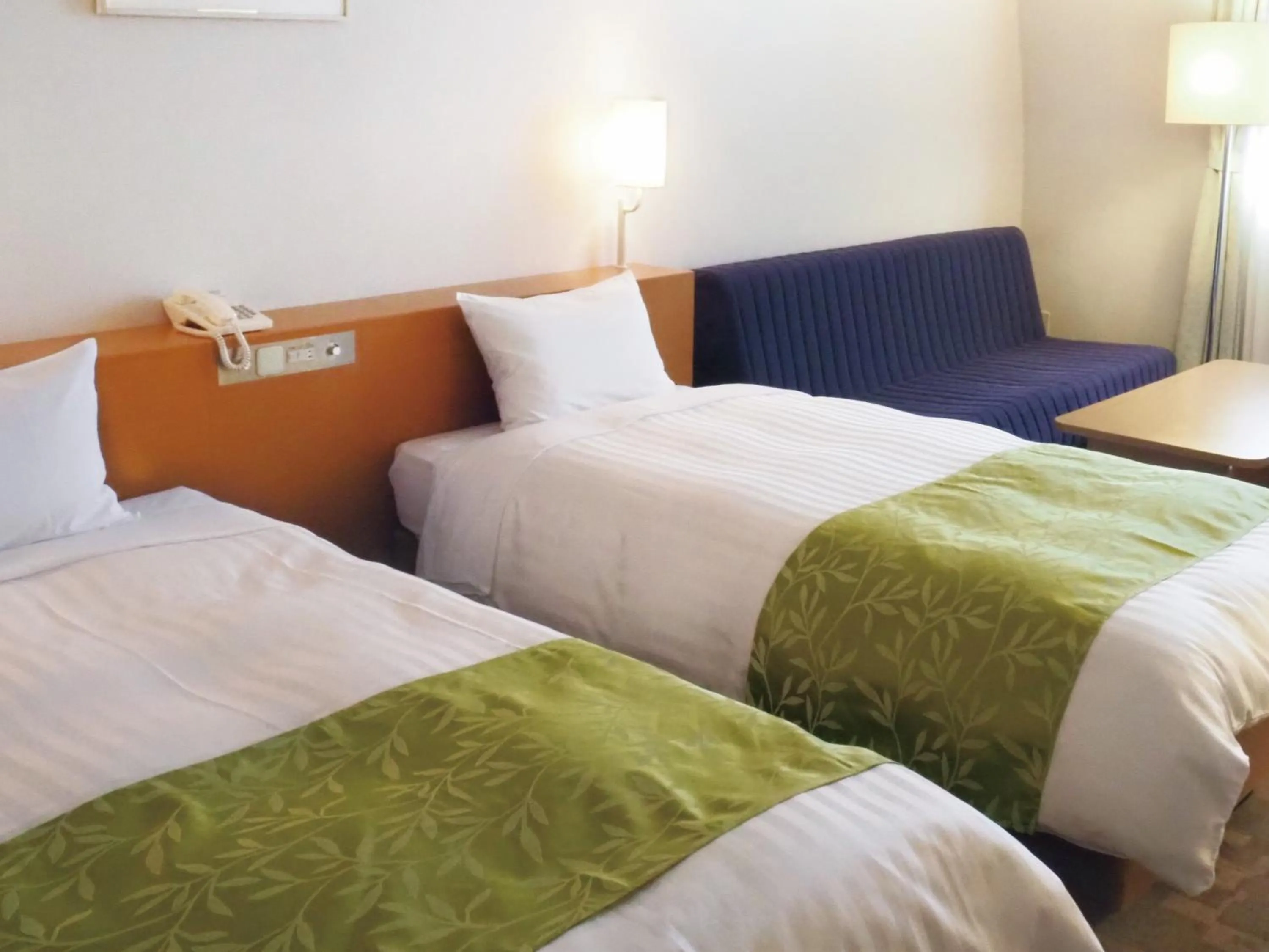 Photo of the whole room, Bed in Hotel Hiroshima Sunplaza