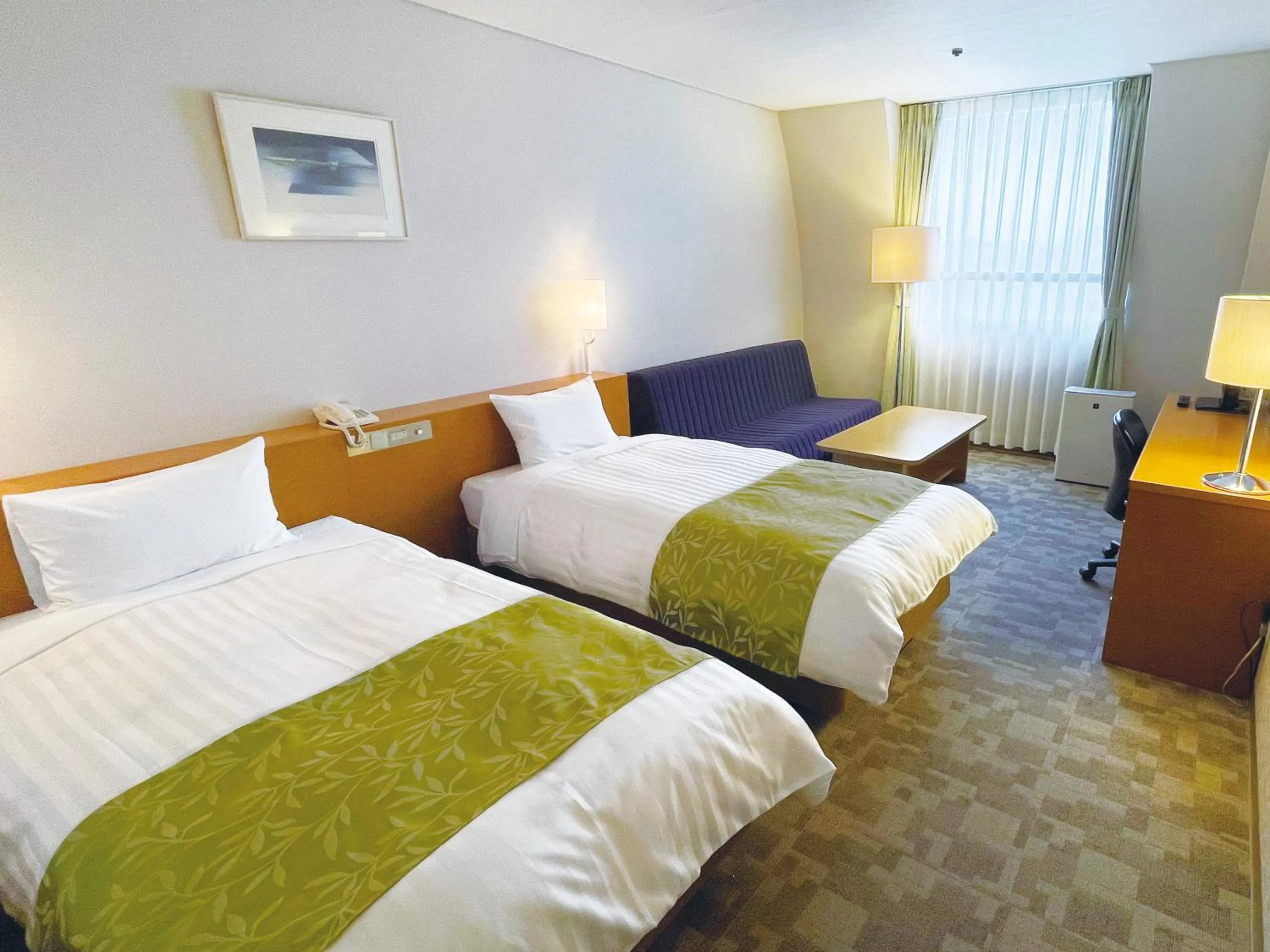 Photo of the whole room, Bed in Hotel Hiroshima Sunplaza