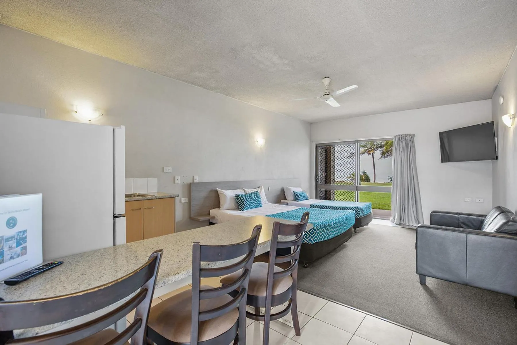 Bed in Sarina Beach Motel