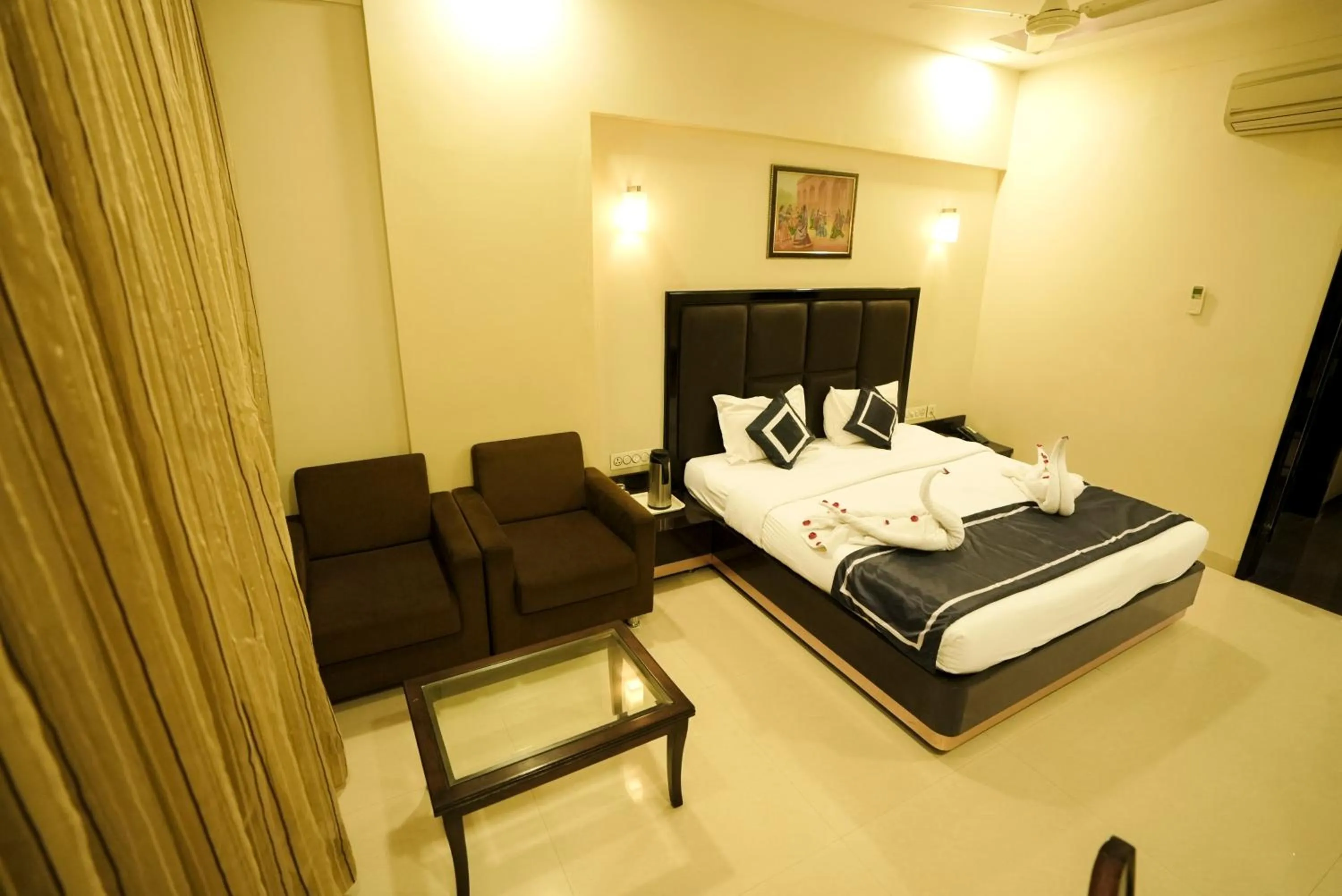 Photo of the whole room, Bed in Chandra Imperial