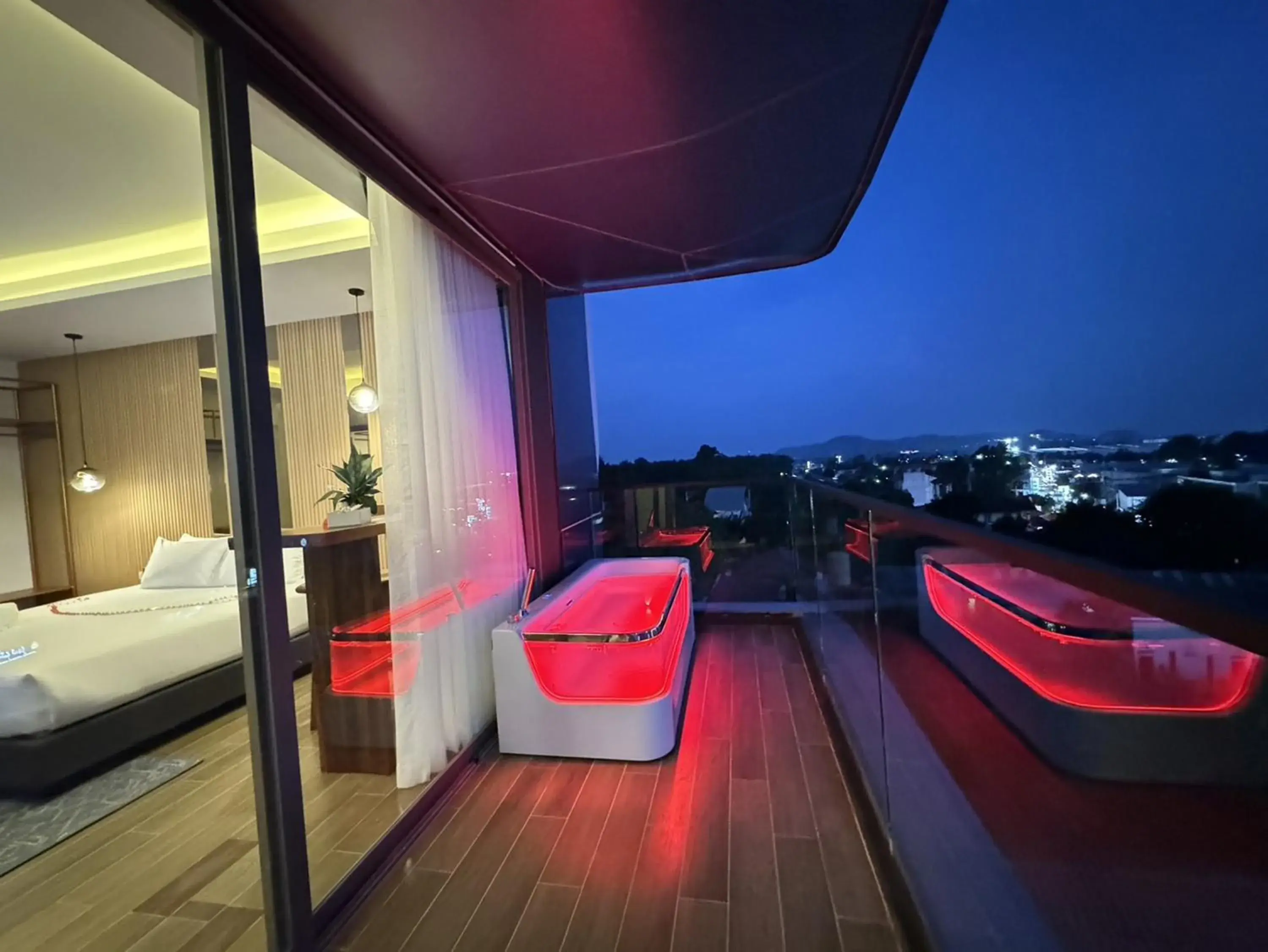 Balcony/Terrace, Bed in The Blue Hotel Balcony/Terrace, Bed in The Blue Hotel