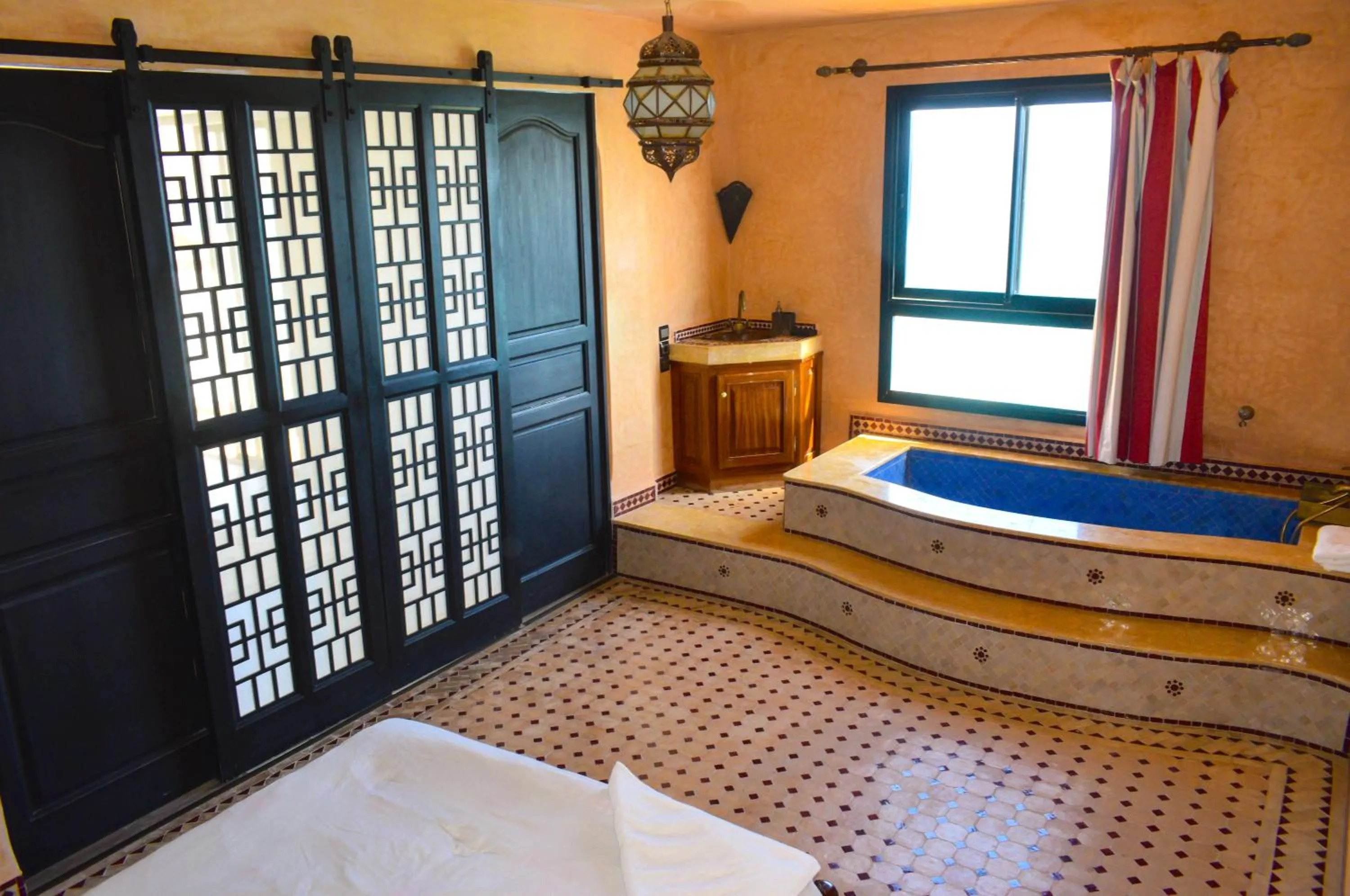 Bathroom, Bed in Bouad Seafront Apartments & Rooms