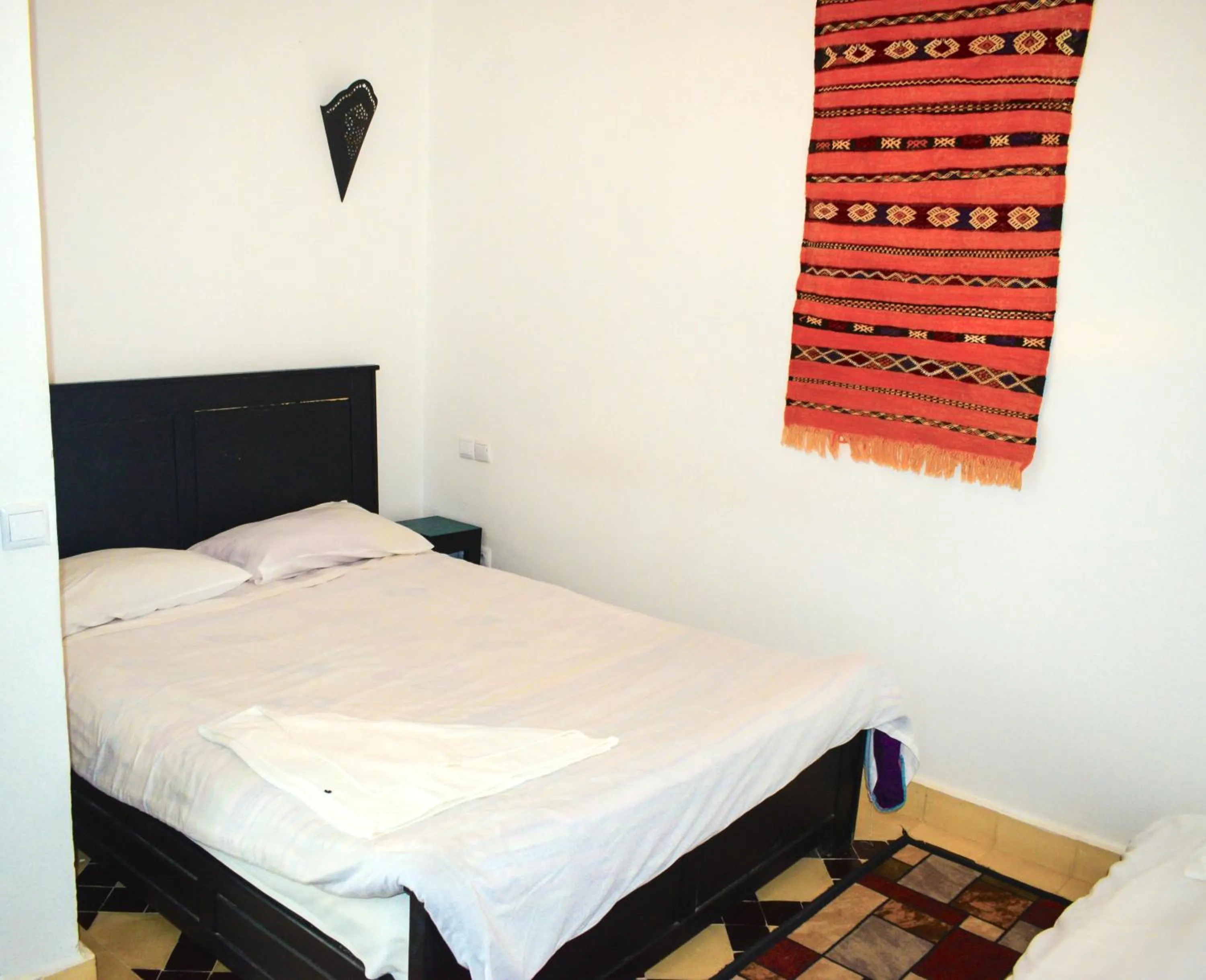 Bed in Bouad Seafront Apartments & Rooms