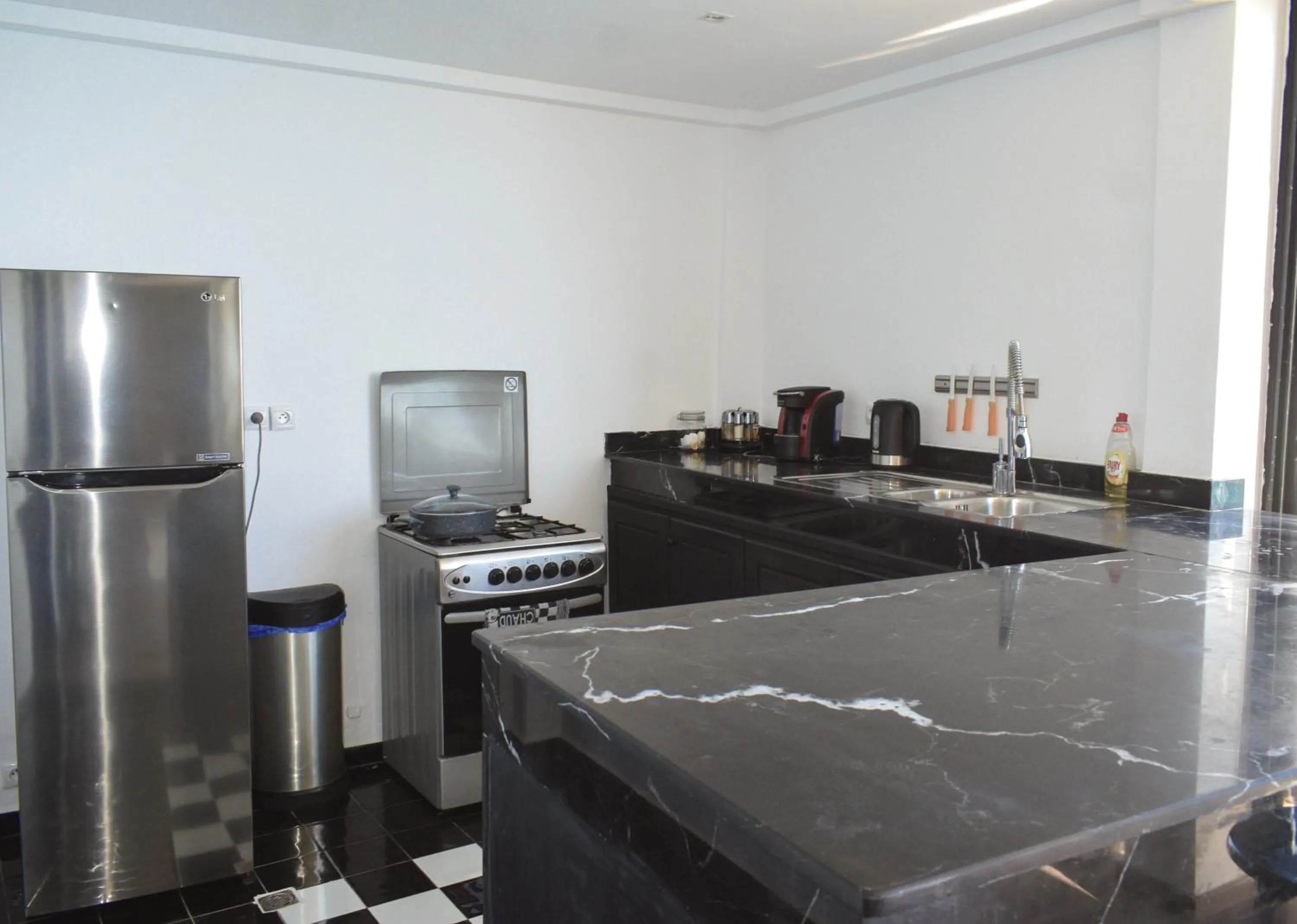 Kitchen or kitchenette in Bouad Seafront Apartments & Rooms