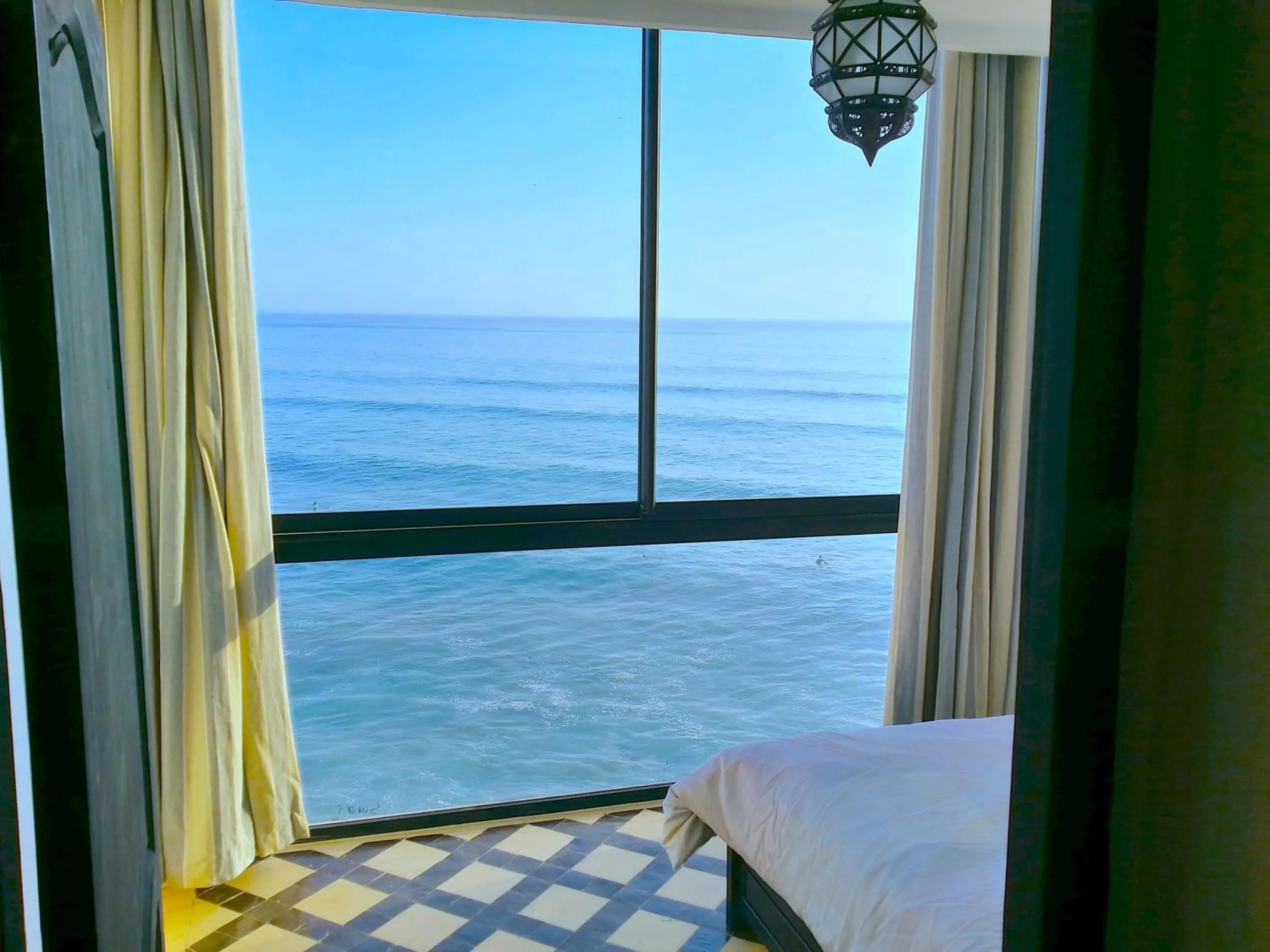 Shower, Bed in Bouad Seafront Apartments & Rooms