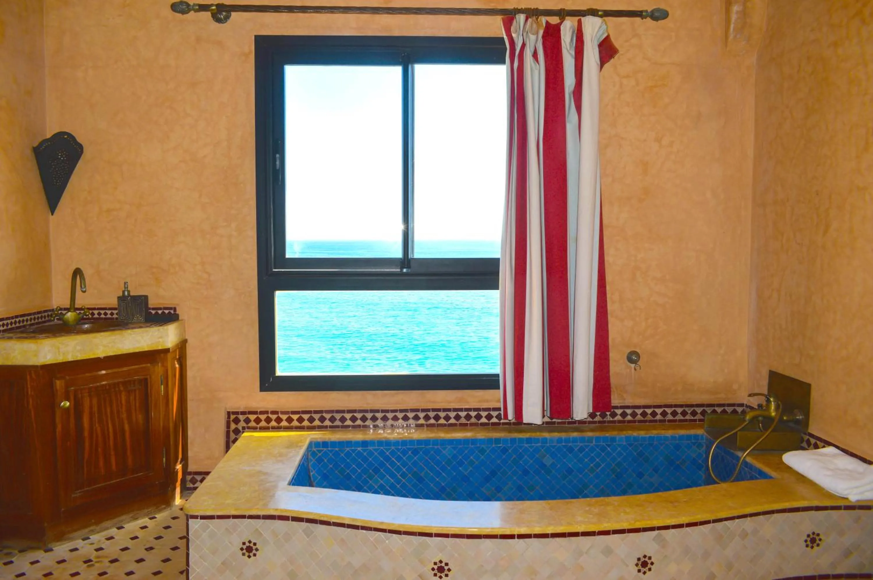 Bathroom in Bouad Seafront Apartments & Rooms