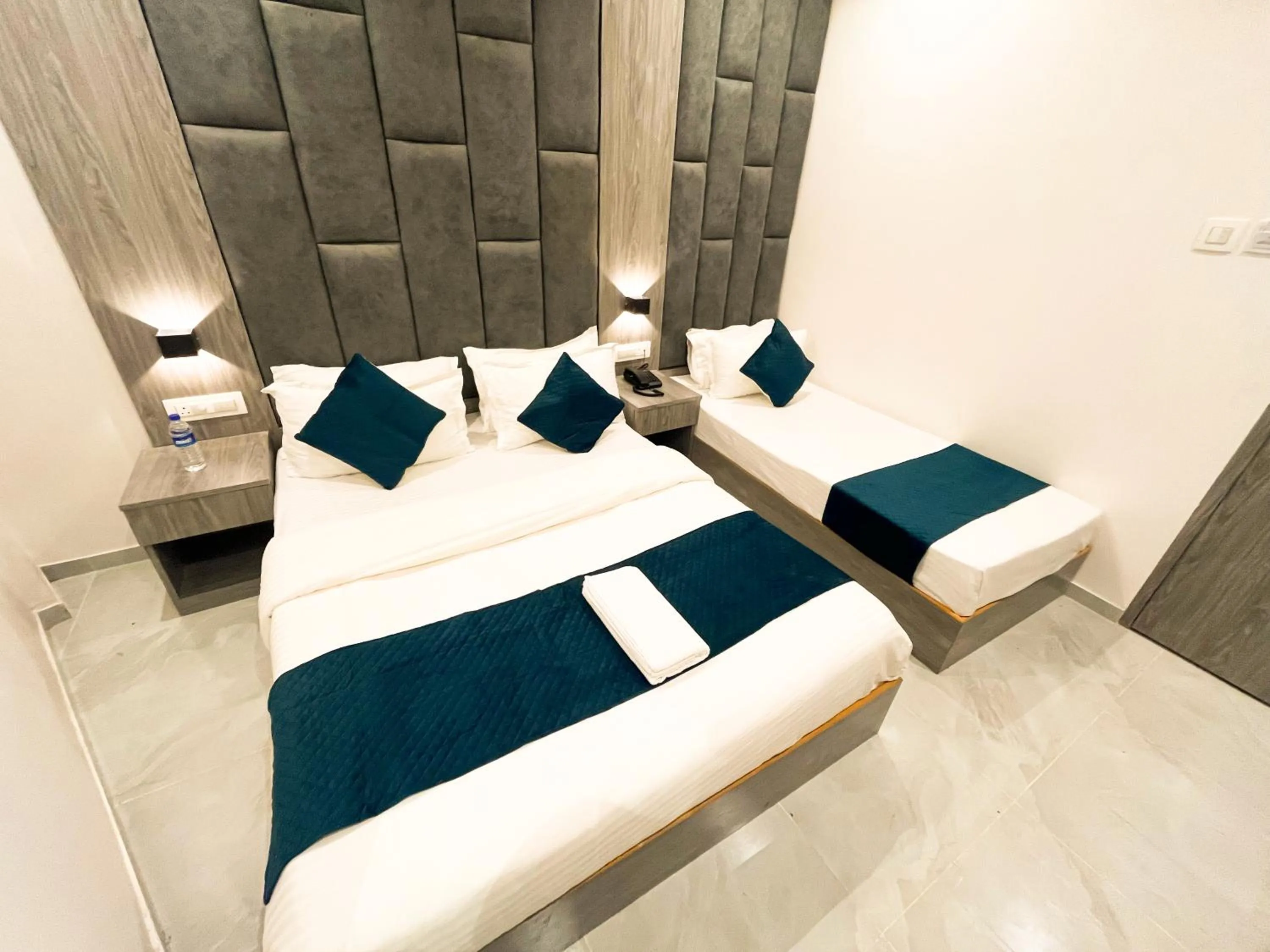 Bed in Hotel Grand Executive