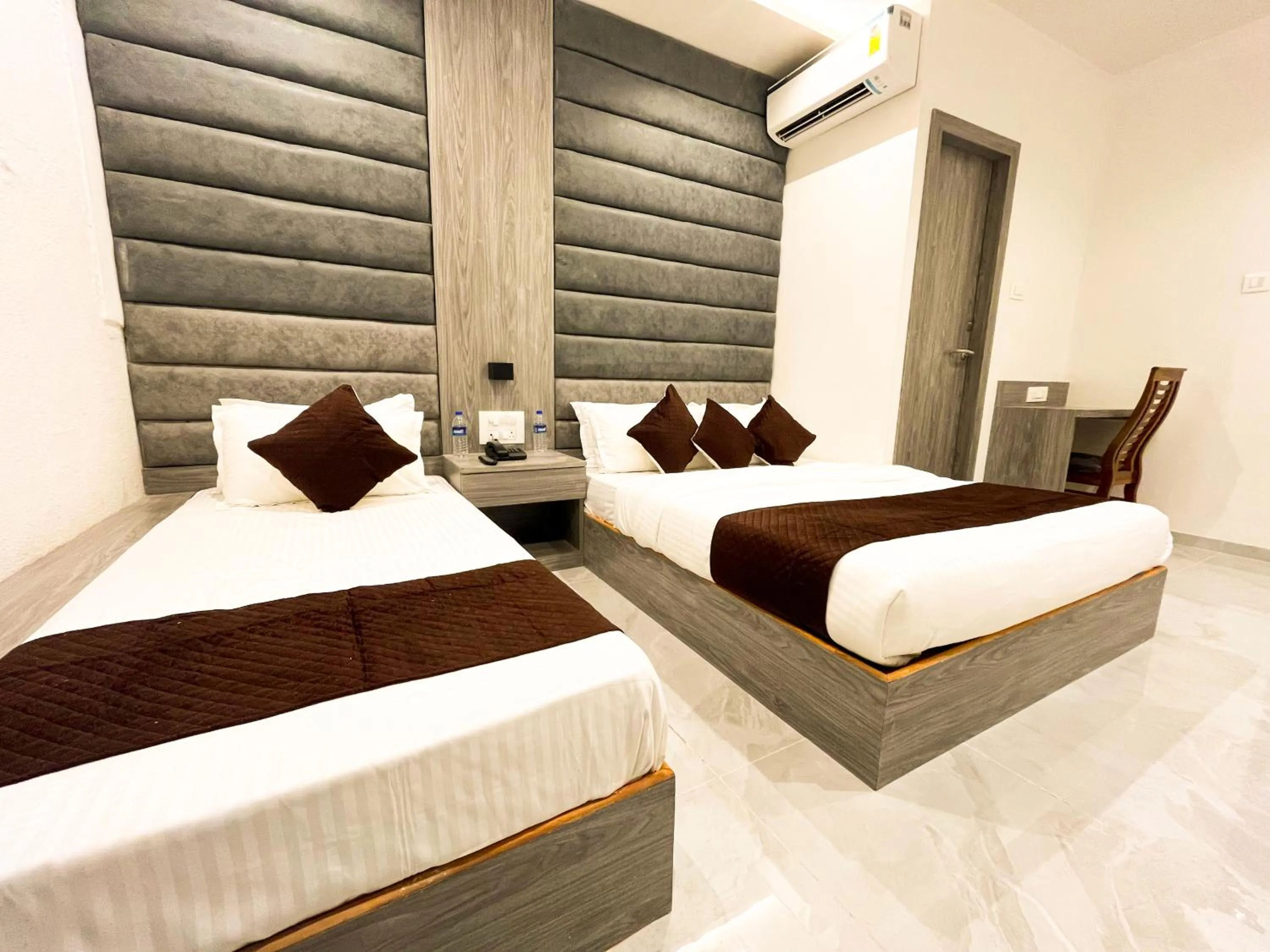 Bed in Hotel Grand Executive