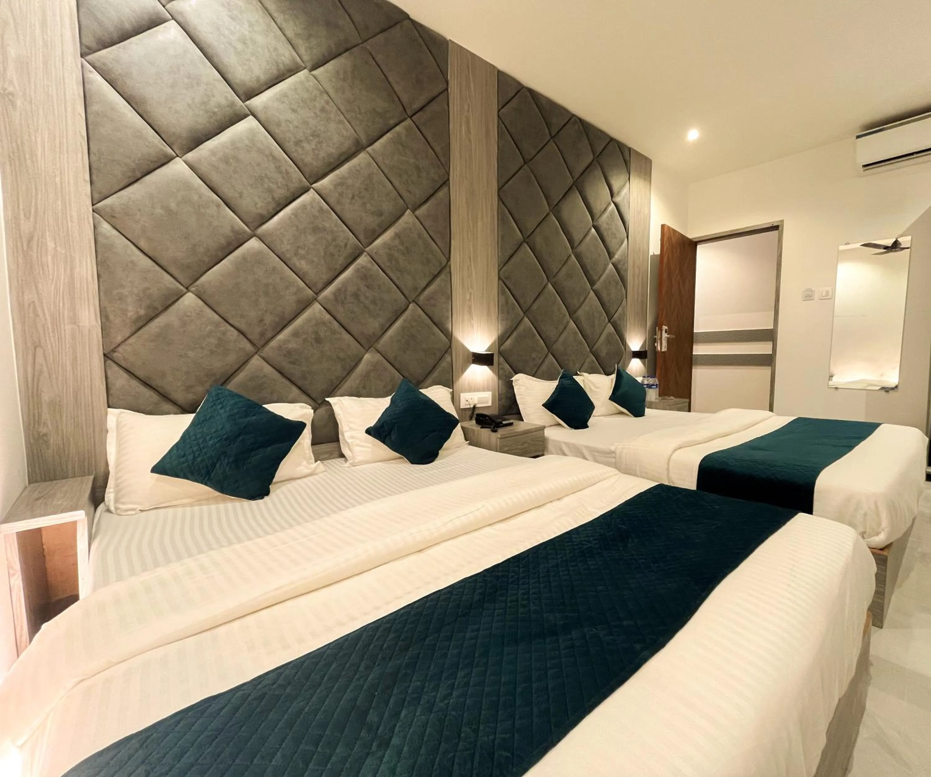 Bed in Hotel Grand Executive