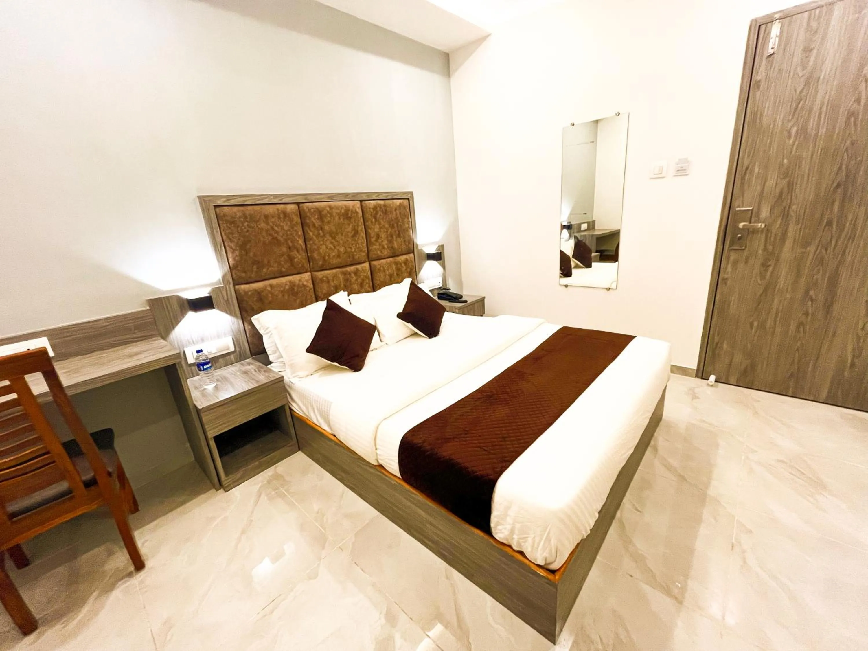 Bed in Hotel Grand Executive