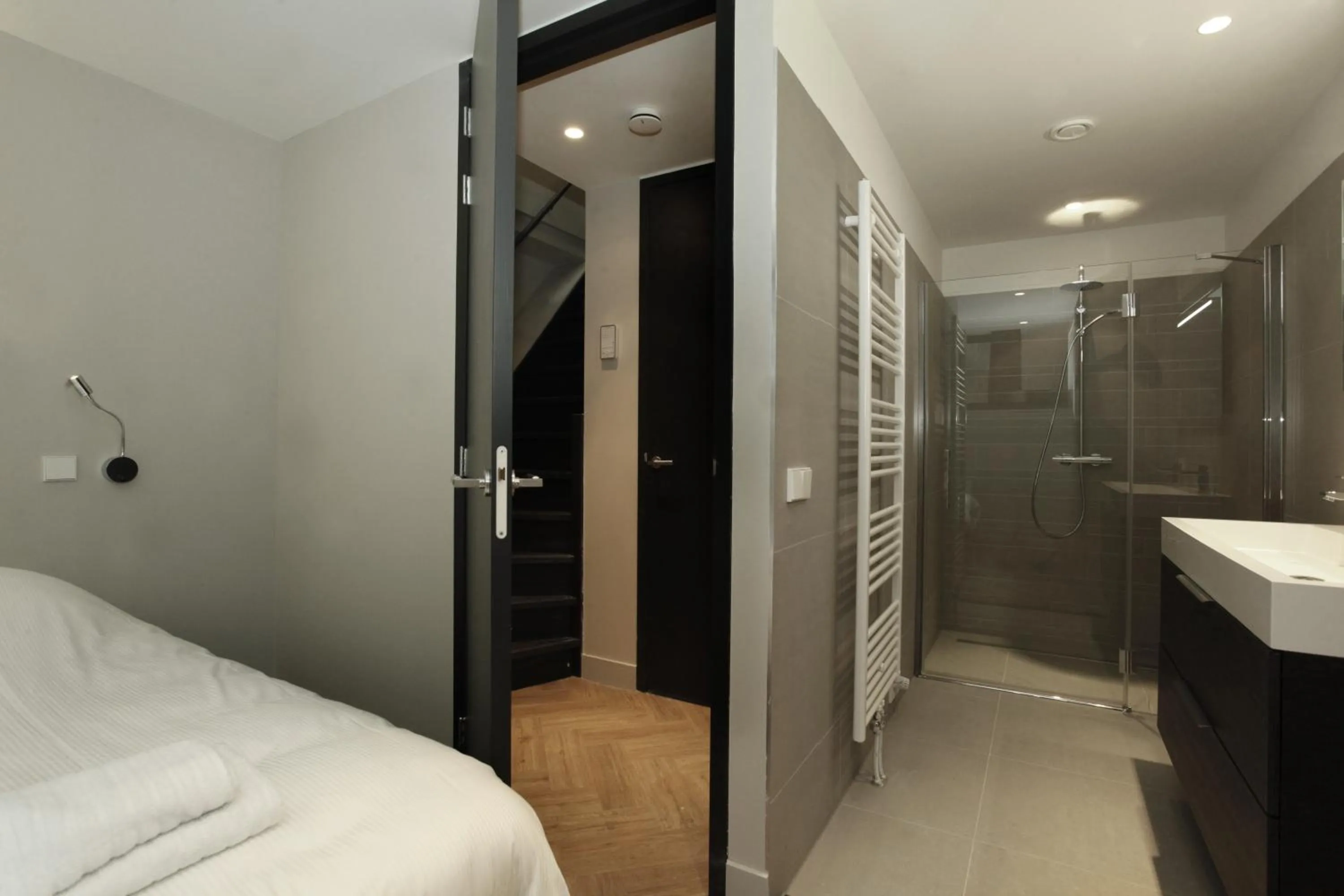 Shower, Bed in Stayci Serviced Apartments Westeinde