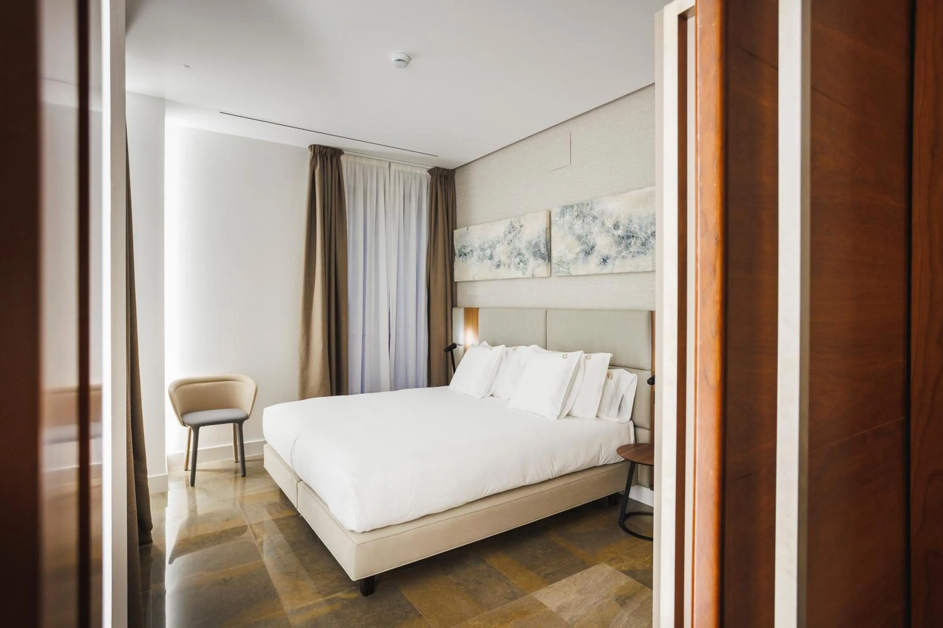 Bed in Corral del Carbón GG Luxury Hotel Boutique