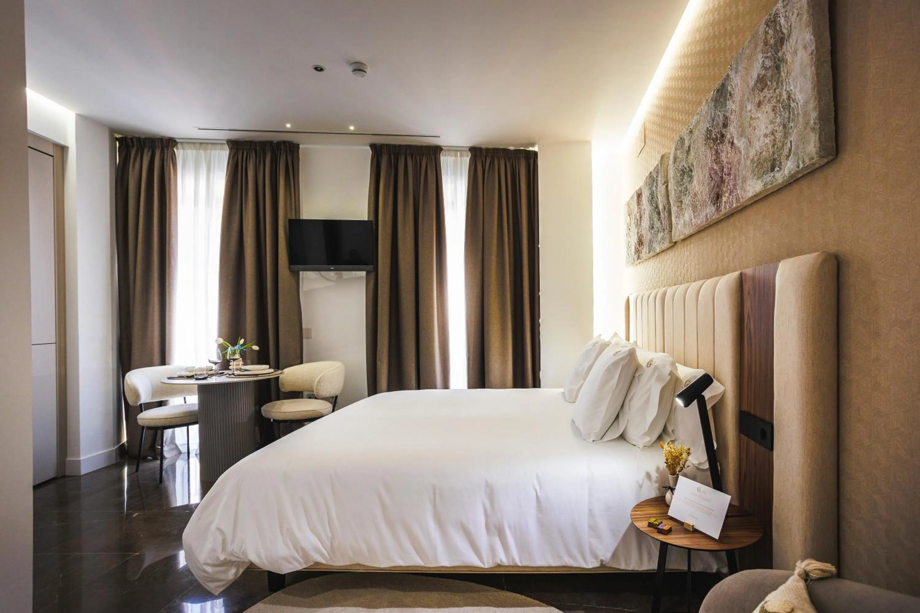 Bed in Corral del Carbón GG Luxury Hotel Boutique
