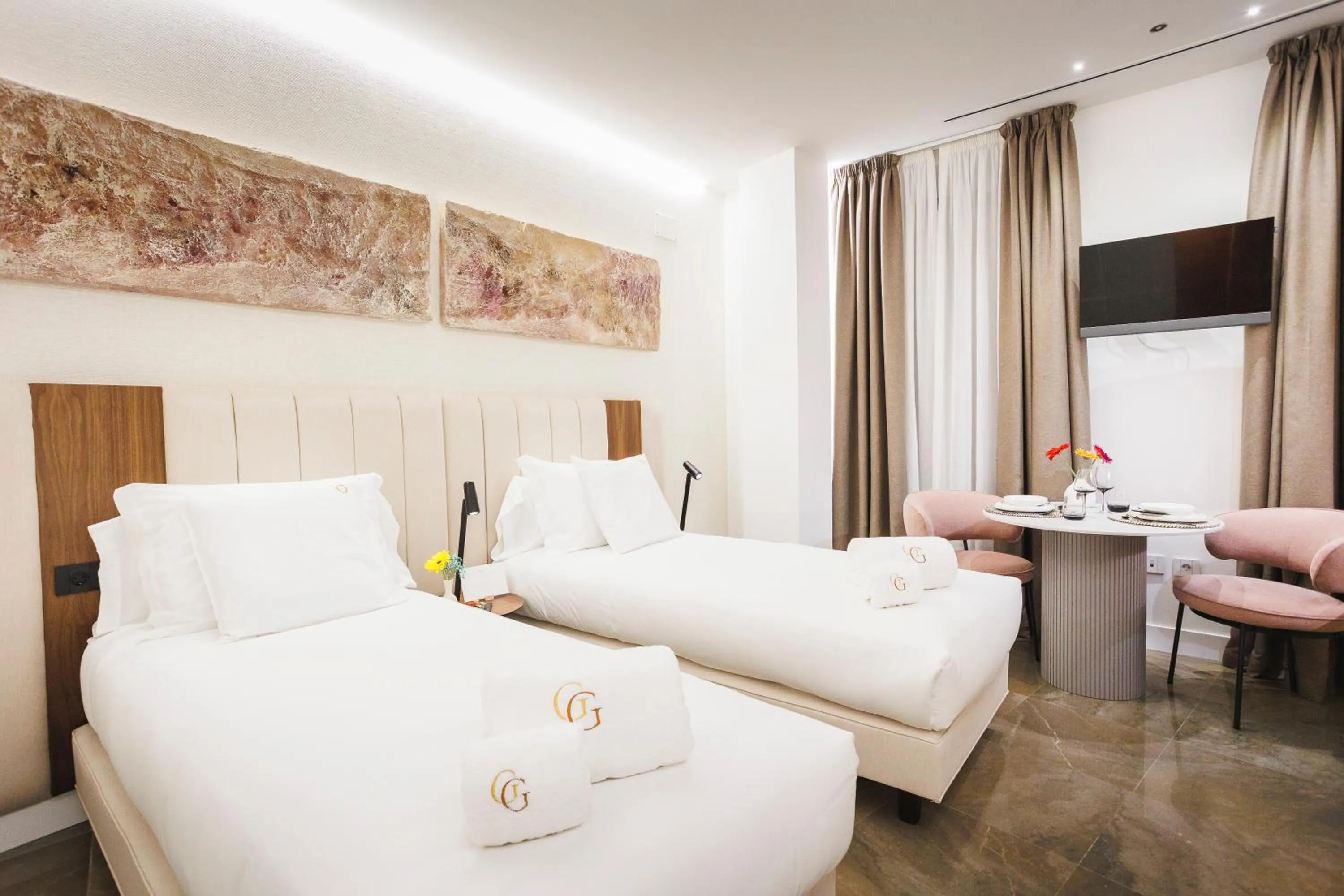 Bed in Corral del Carbón GG Luxury Hotel Boutique