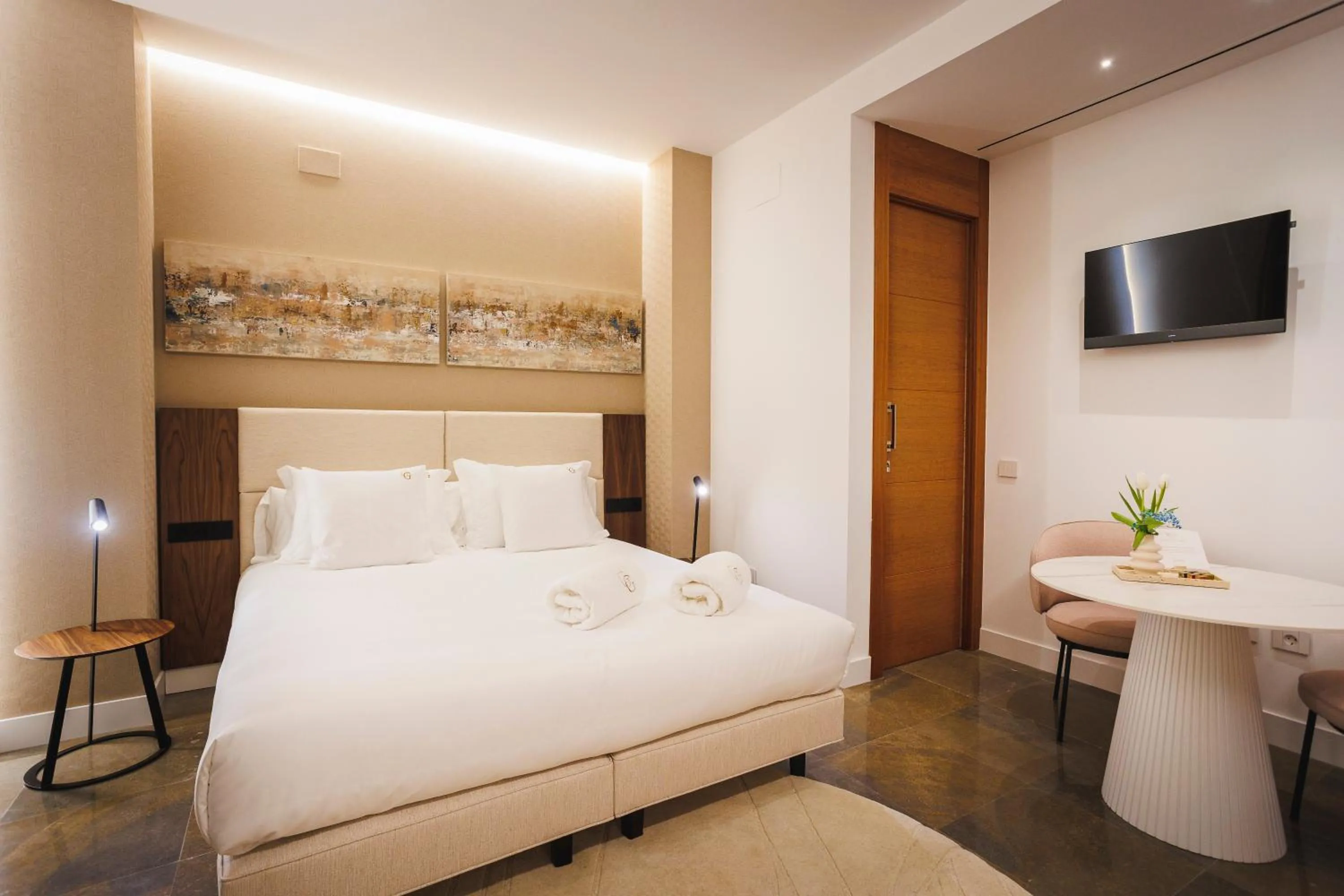 Bed in Corral del Carbón GG Luxury Hotel Boutique