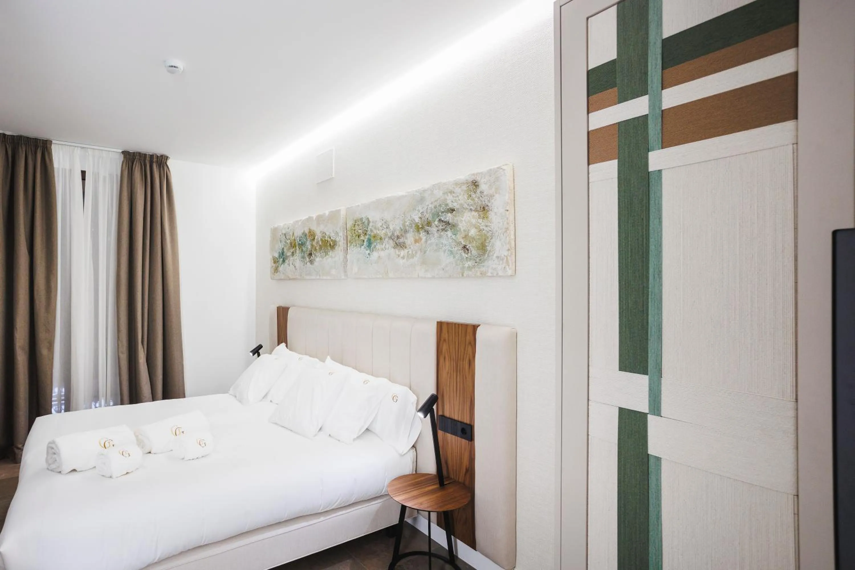 Bed in Corral del Carbón GG Luxury Hotel Boutique