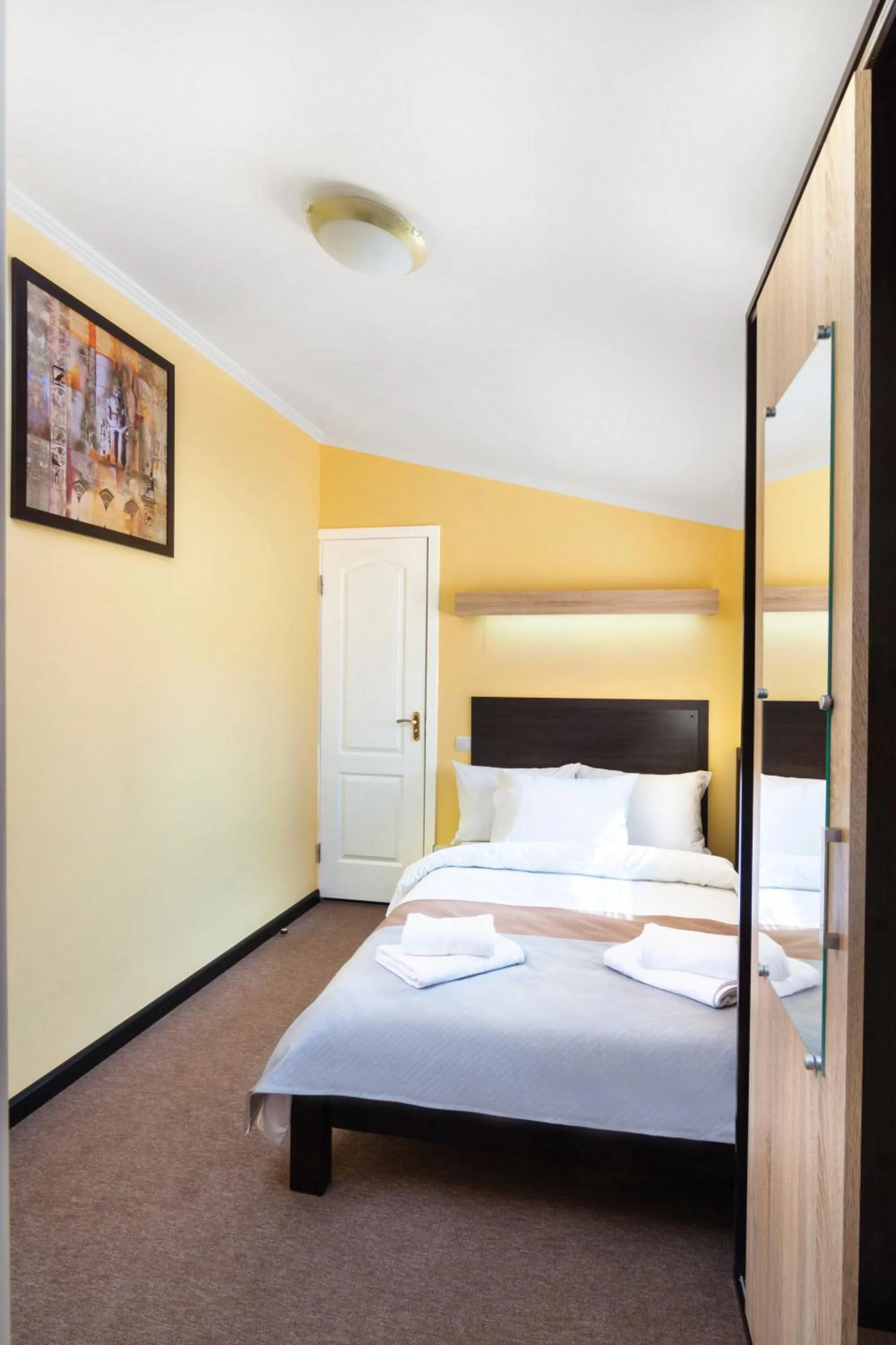 Bed in Orange Hotel