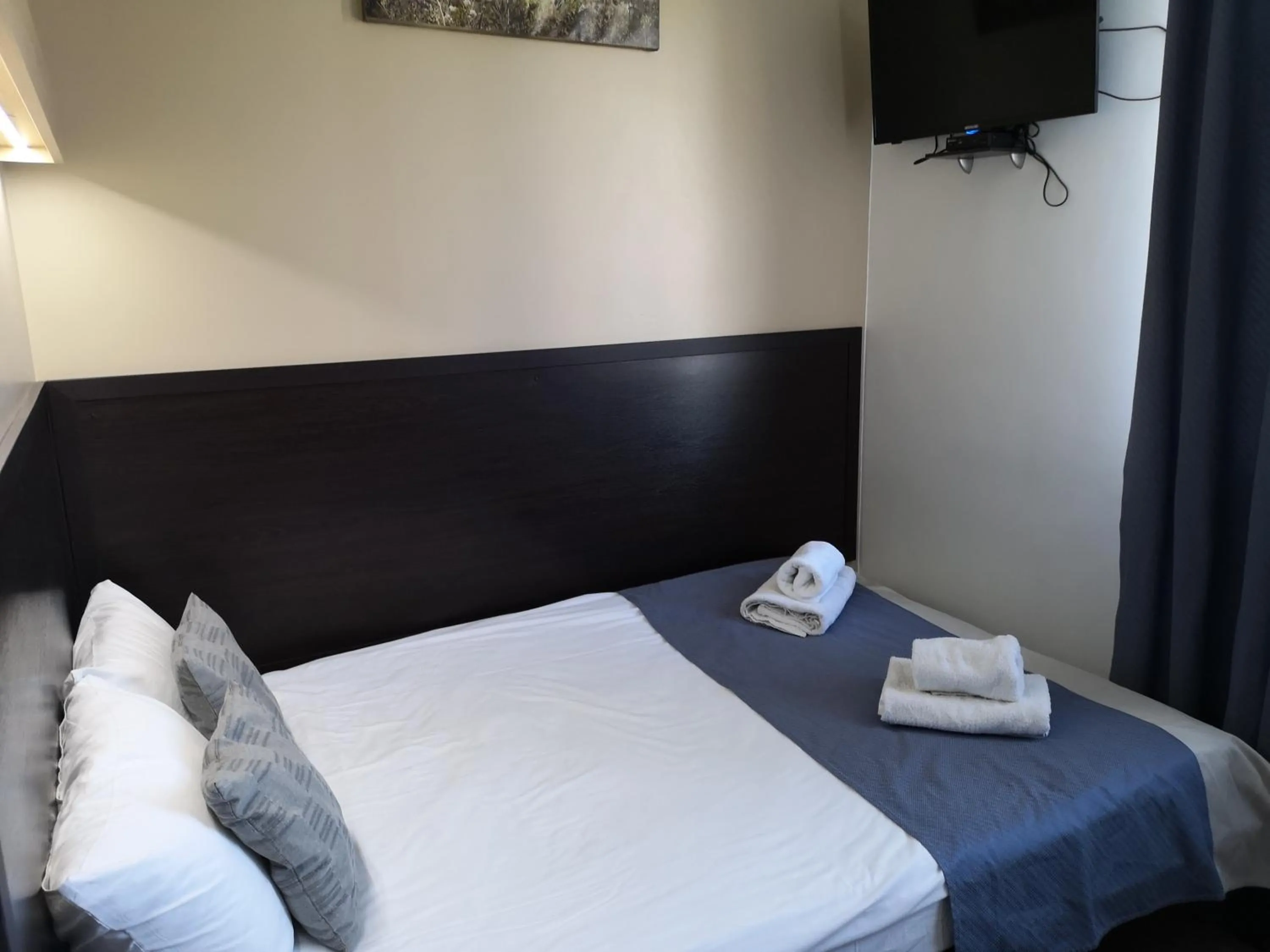 Bed in Orange Hotel