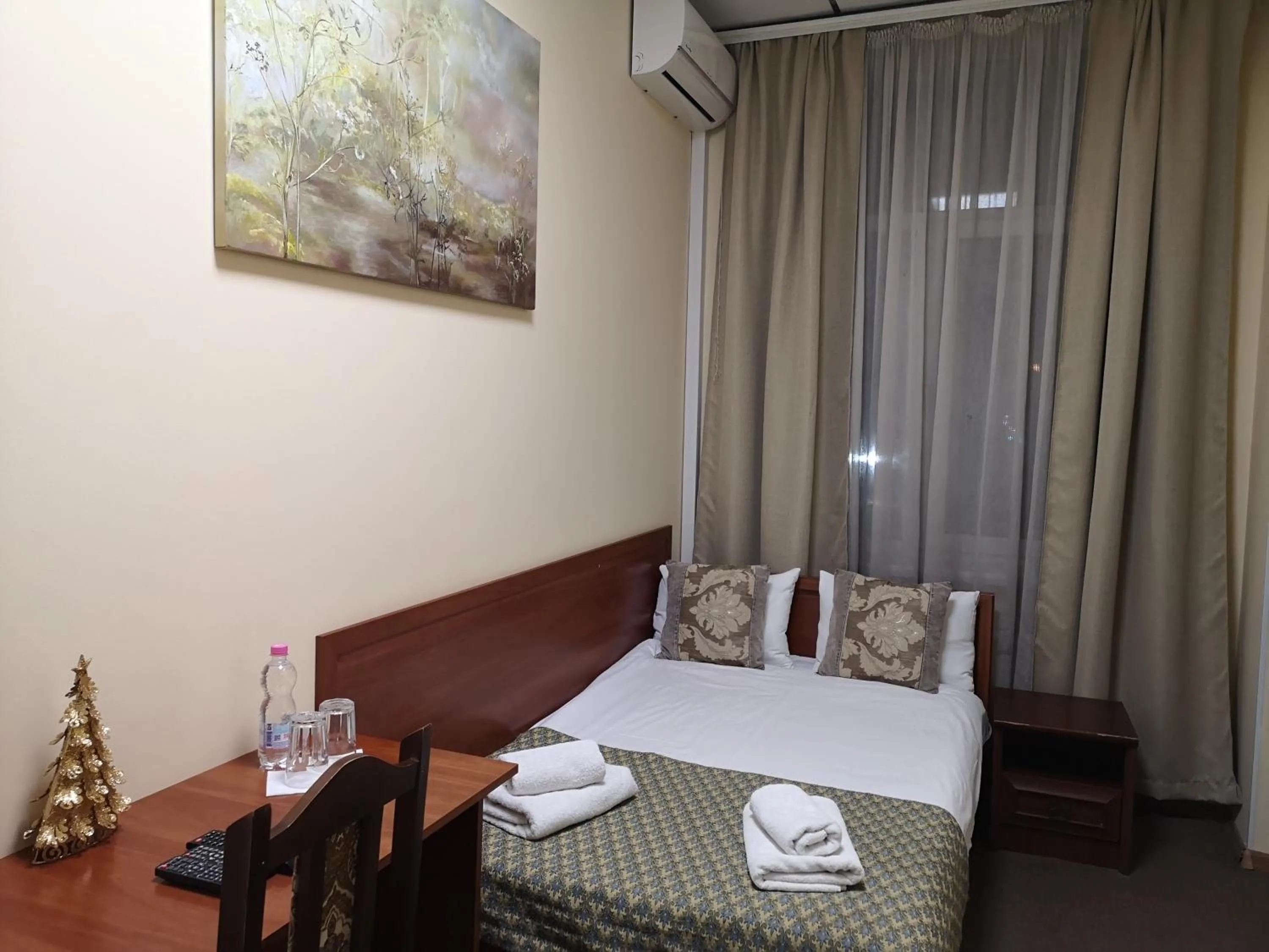 Bed in Orange Hotel