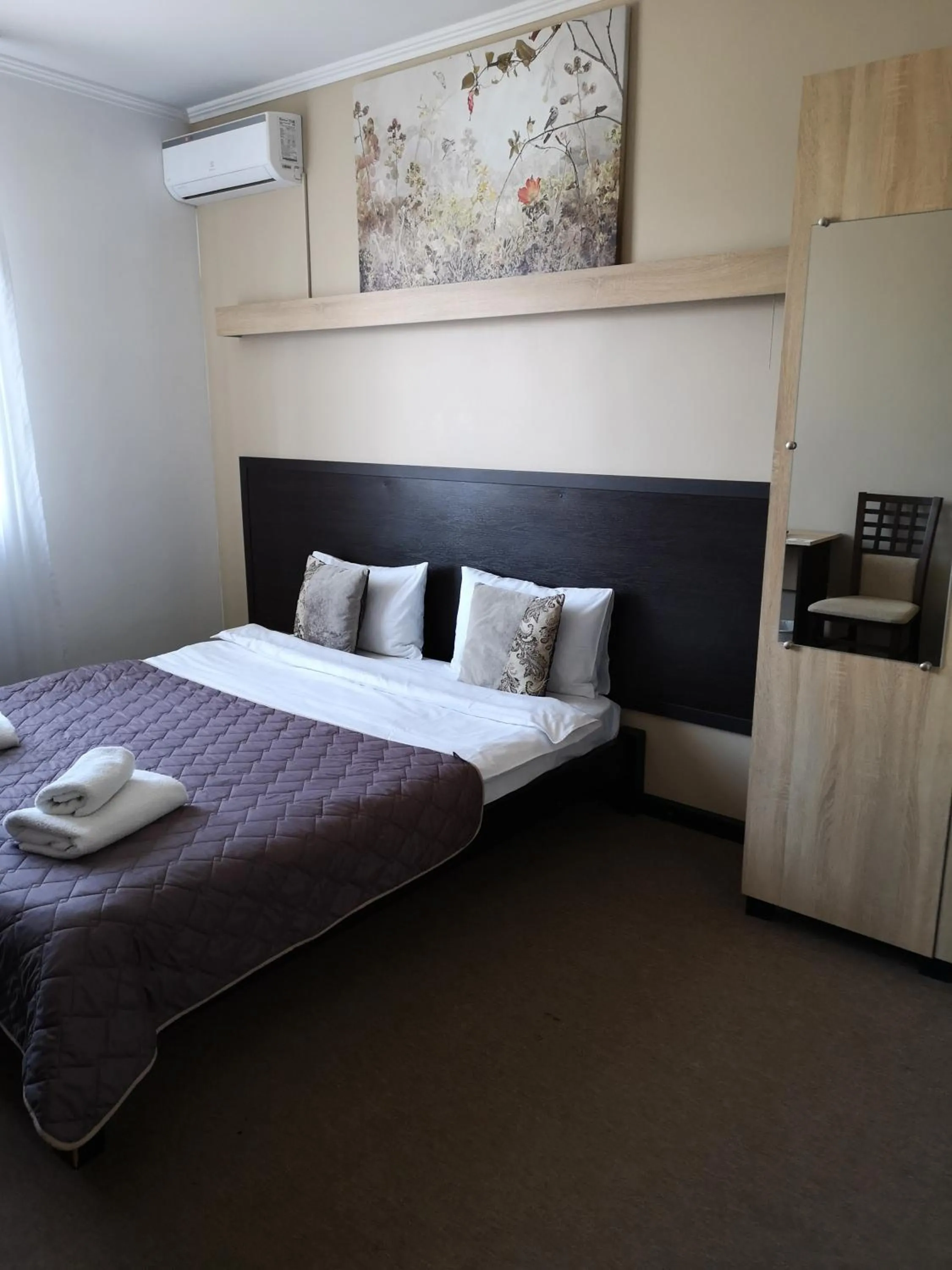Bed in Orange Hotel