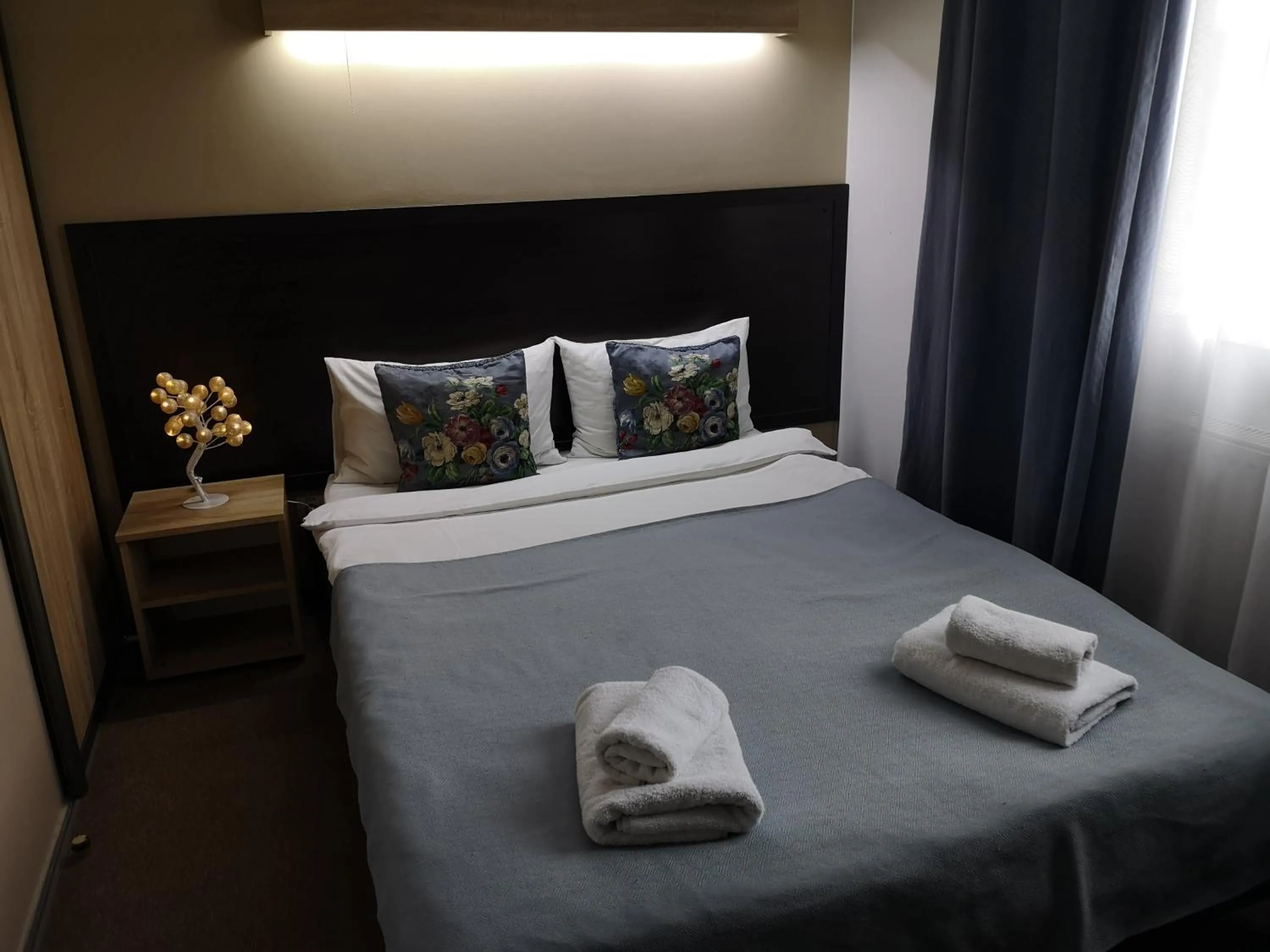 Bed in Orange Hotel