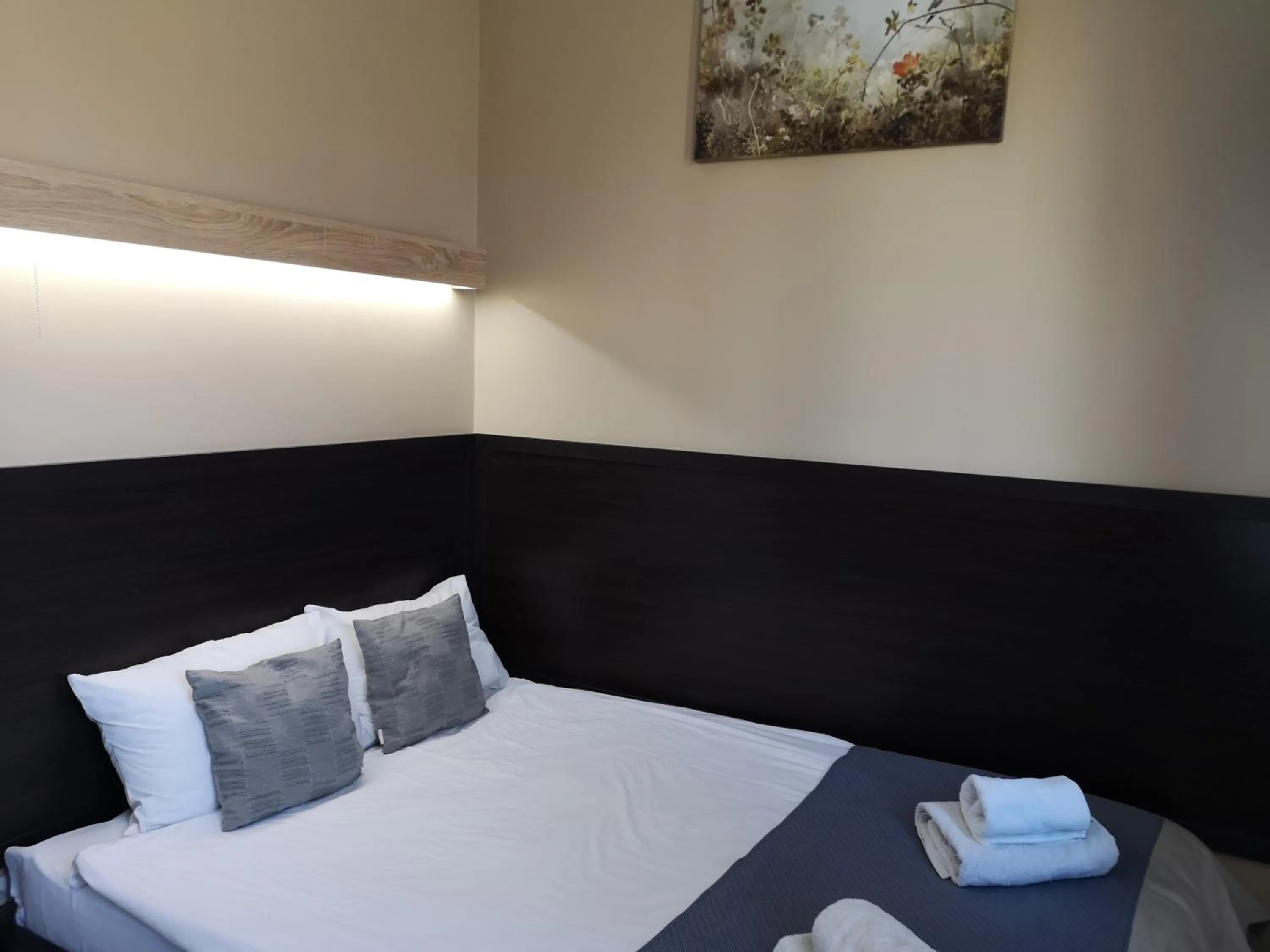 Bed in Orange Hotel