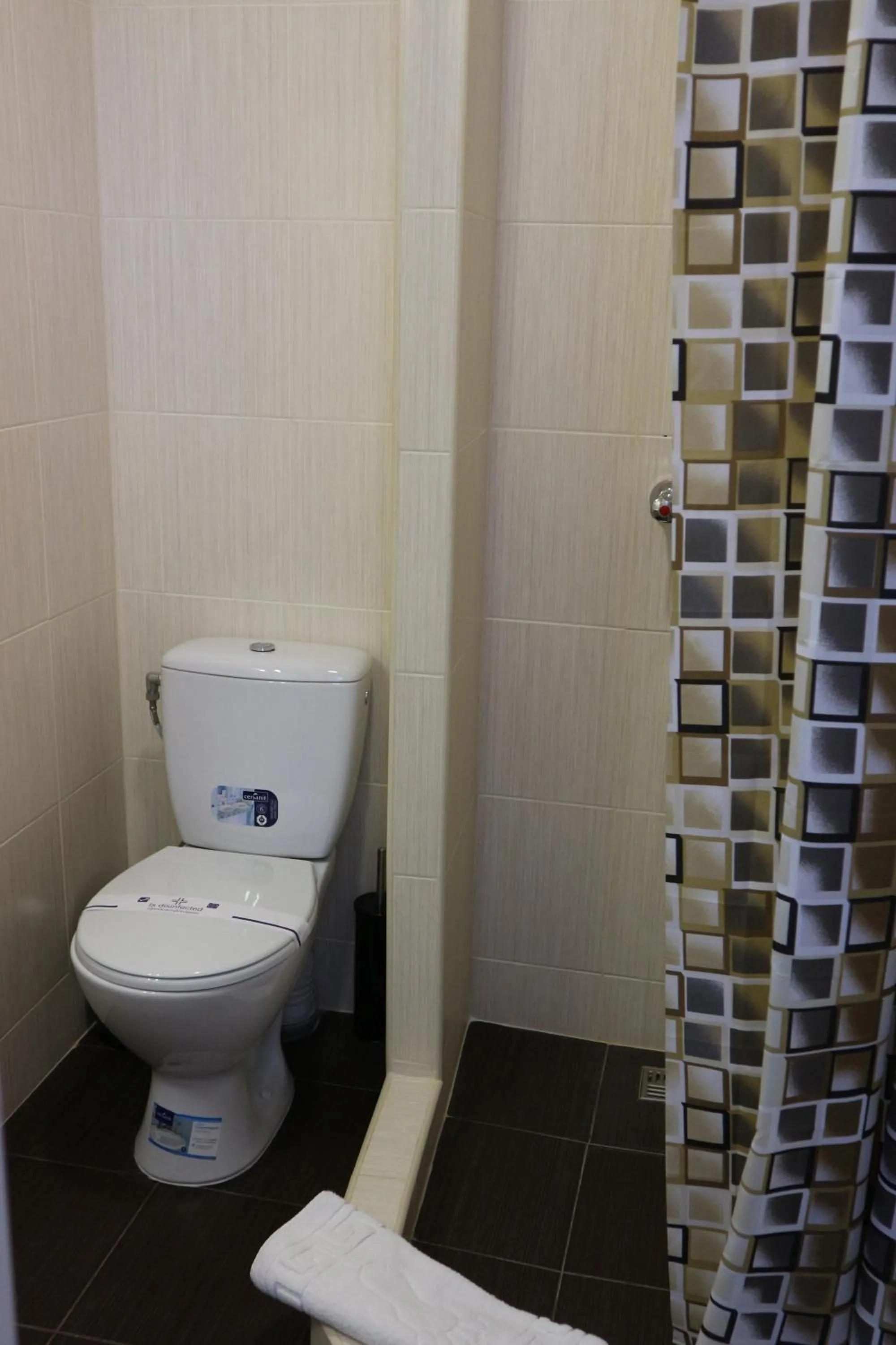 Toilet in Orange Hotel