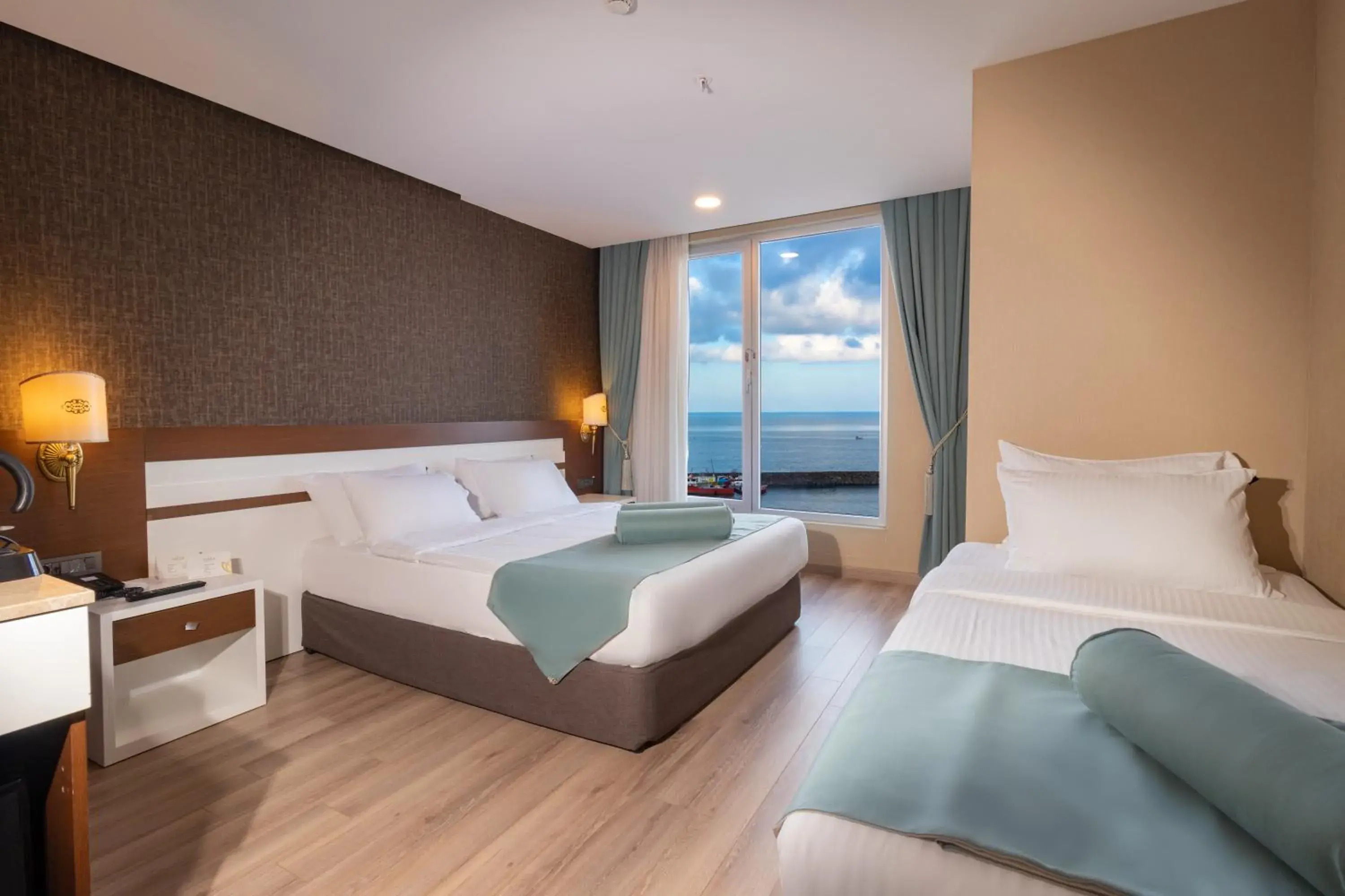 Deluxe Triple Room with Sea View in Tilya Resort Hotel Deluxe Triple Room with Sea View in Tilya Resort Hotel