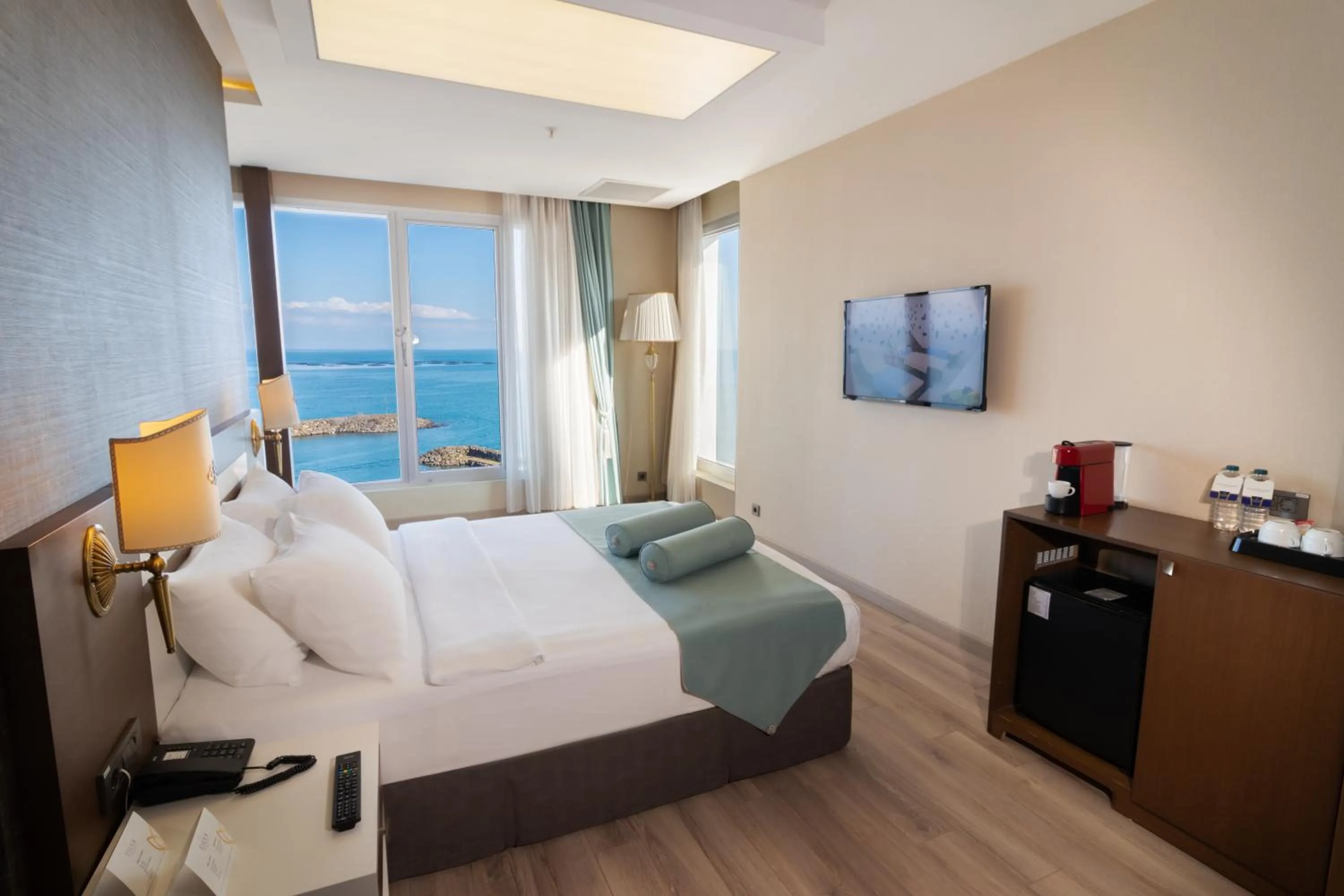 Communal lounge/ TV room, Bed in Tilya Resort Hotel