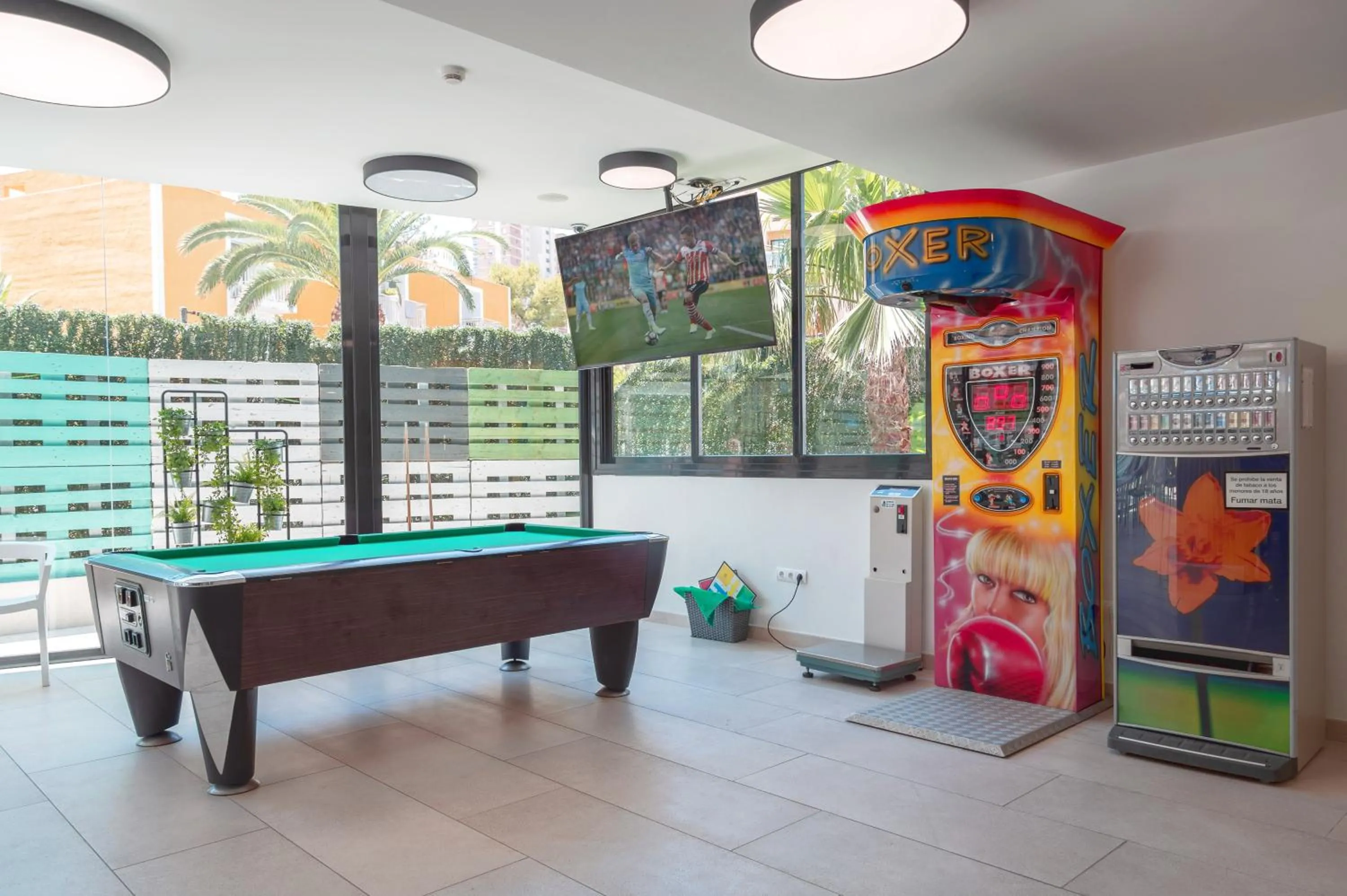 Communal lounge/ TV room in Primavera Loix