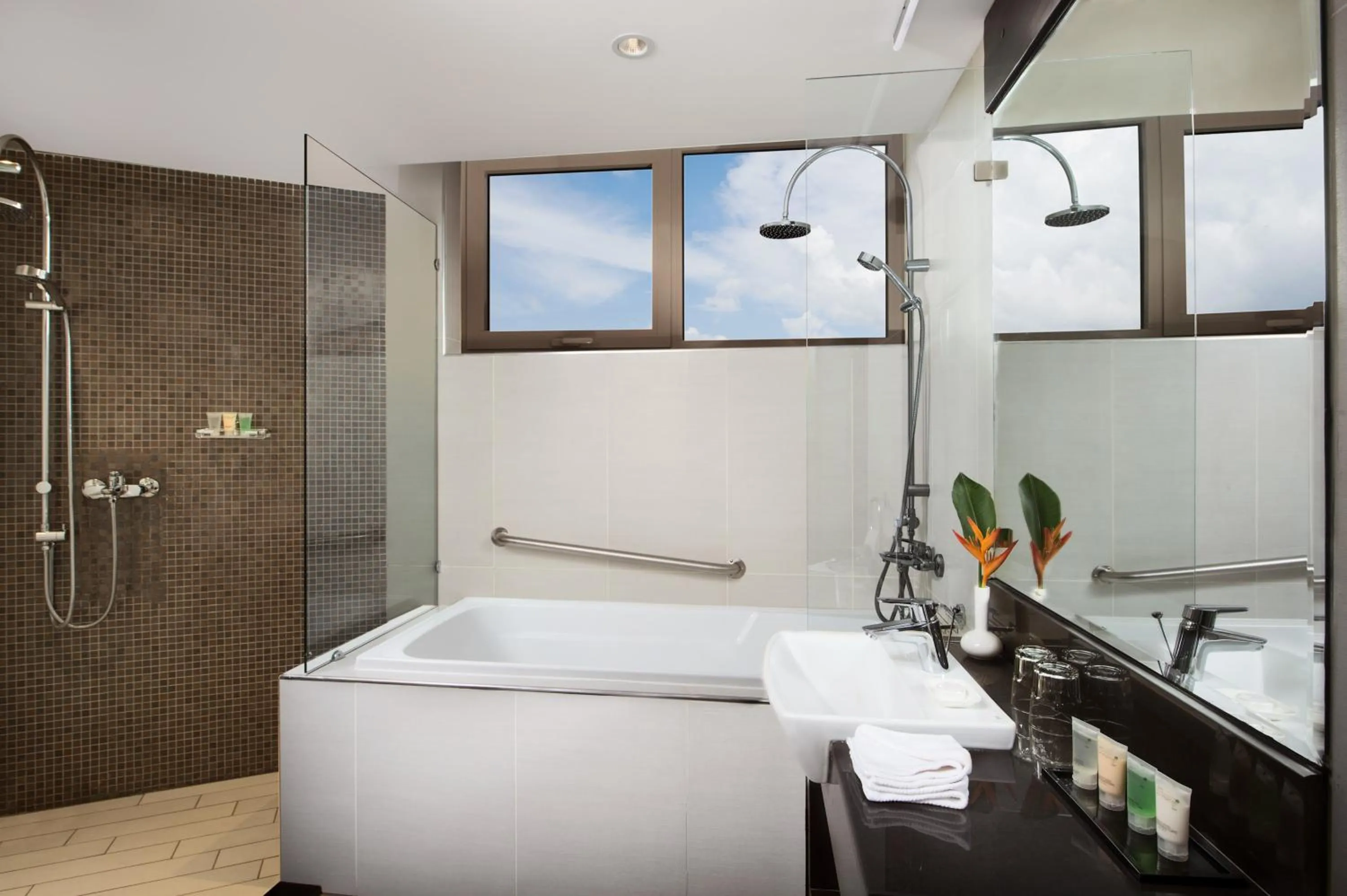 Shower in Ramada Resort By Wyndham Dar es Salaam