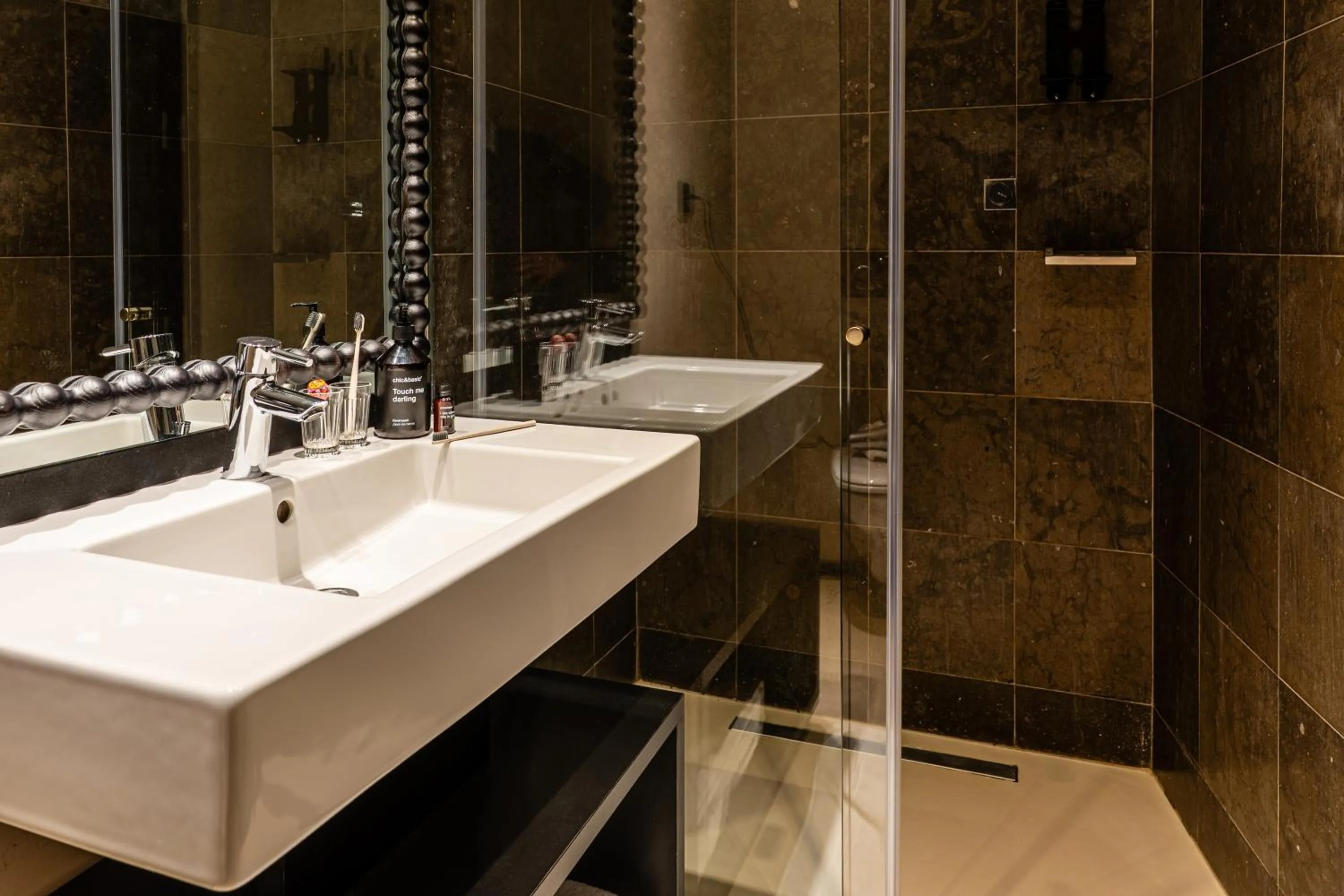 Bathroom in Casa Teva Lisboa Boutique Hotel by chic&basic