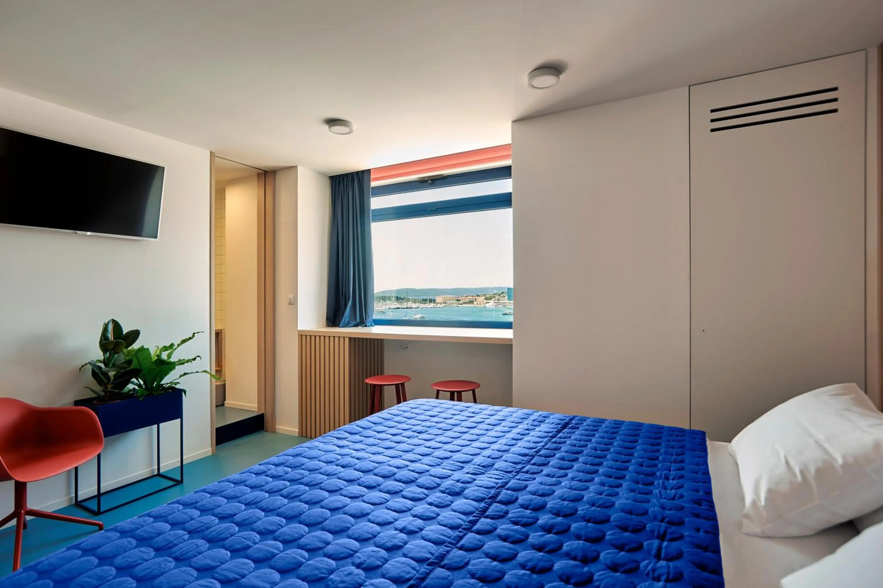 Bed in Horizon Luxury Suites & Design Rooms