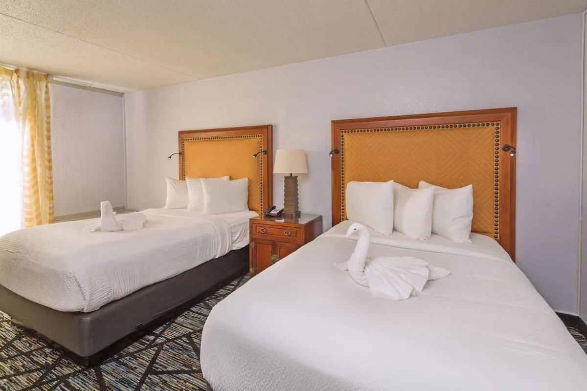 Bed in Home Inn Woods Hotel