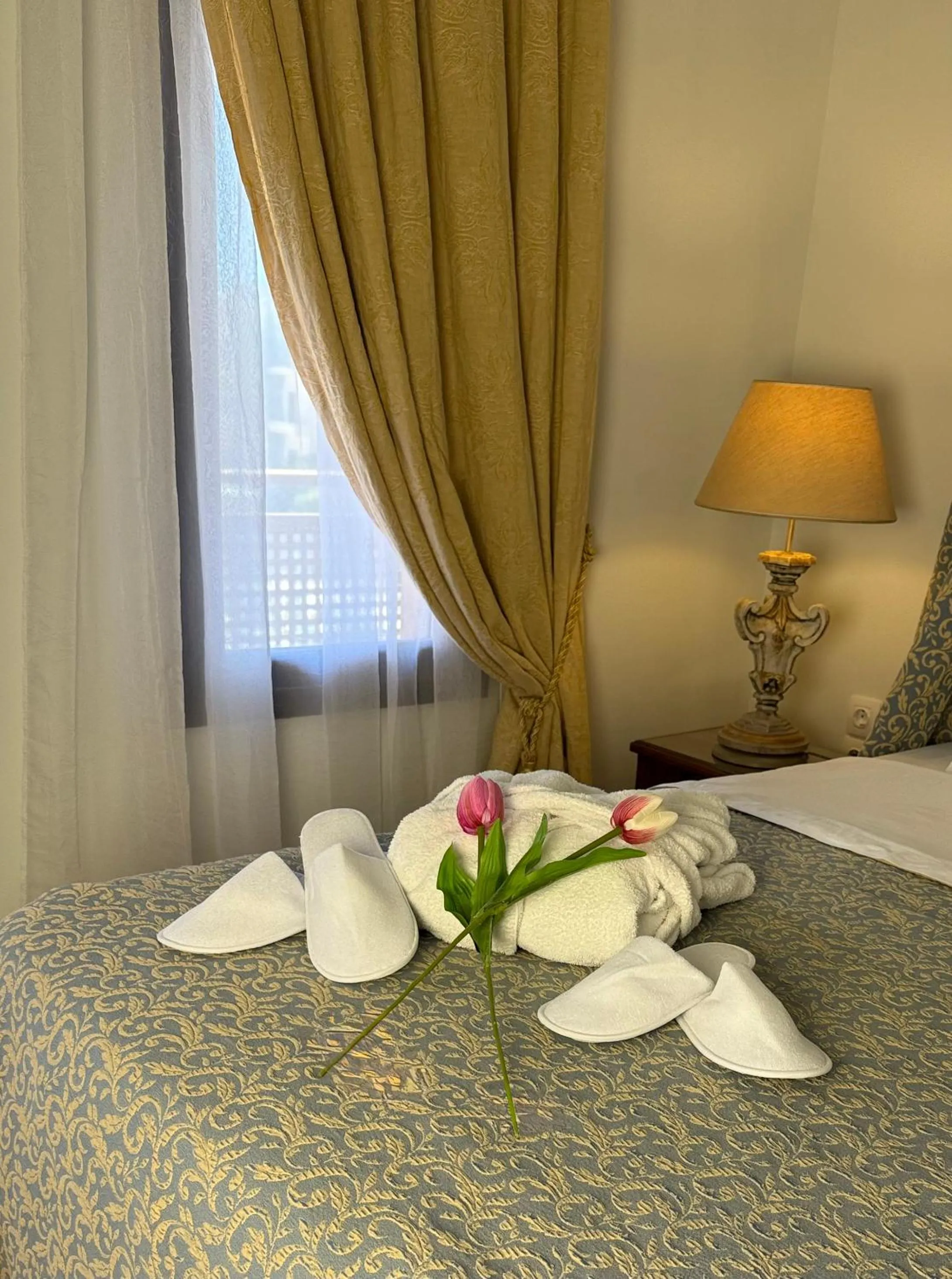 Bed in Great Greece Le Convivial Suites