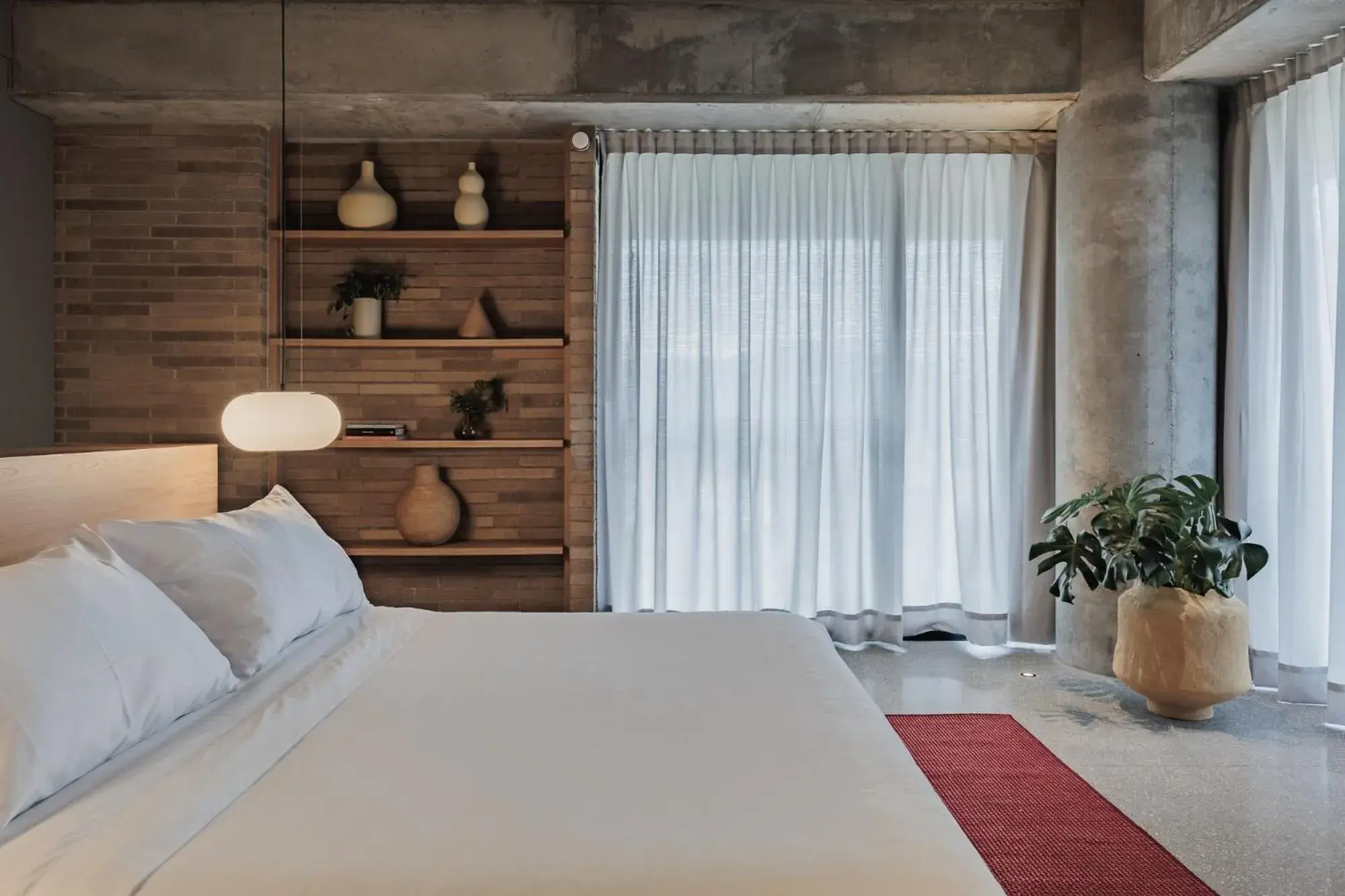Bed in The Somos Loho Hotel Bed in The Somos Loho Hotel