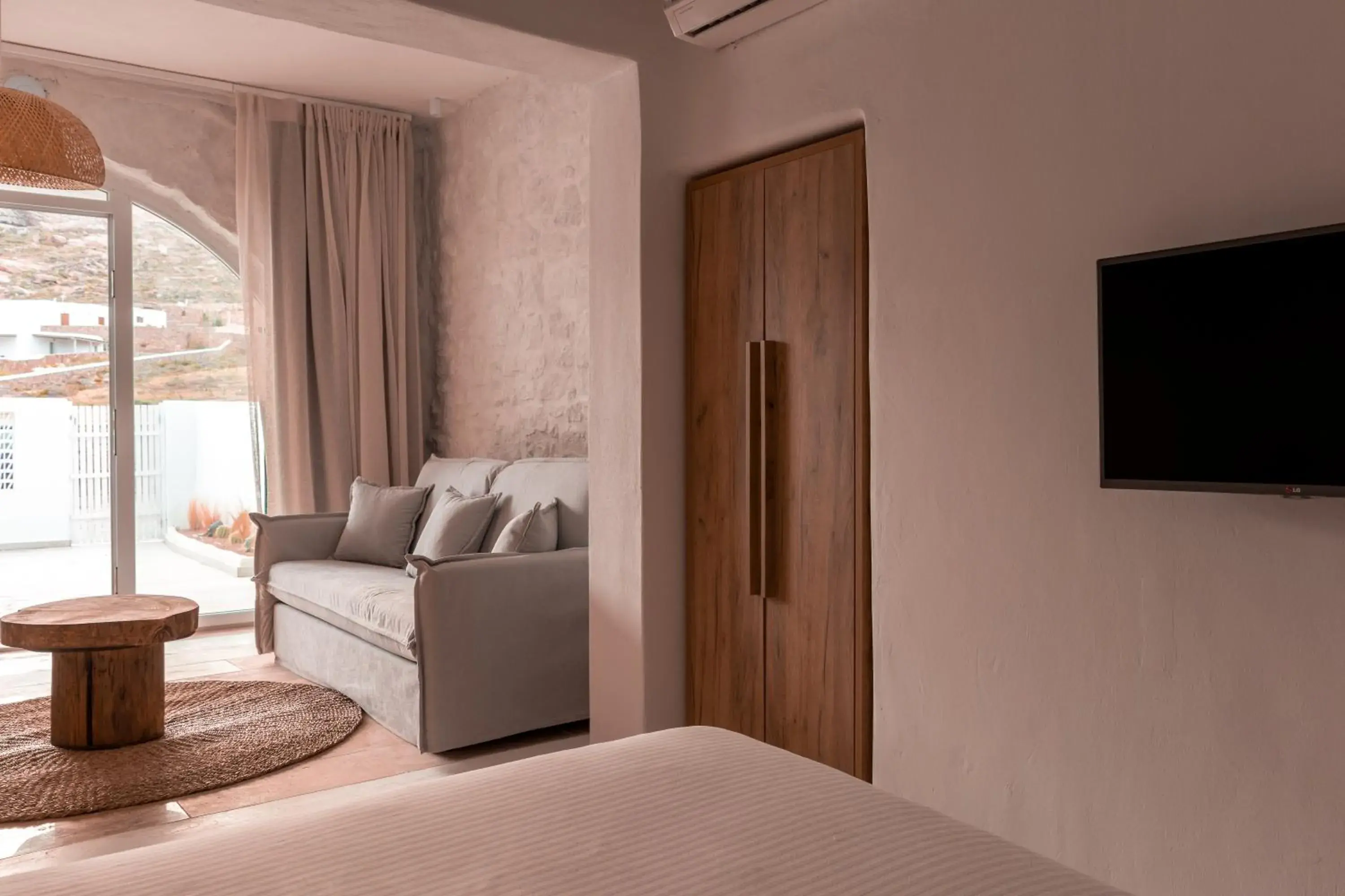 Communal lounge/ TV room, Bed in Senses Luxury Suites & Villas Communal lounge/ TV room, Bed in Senses Luxury Suites & Villas