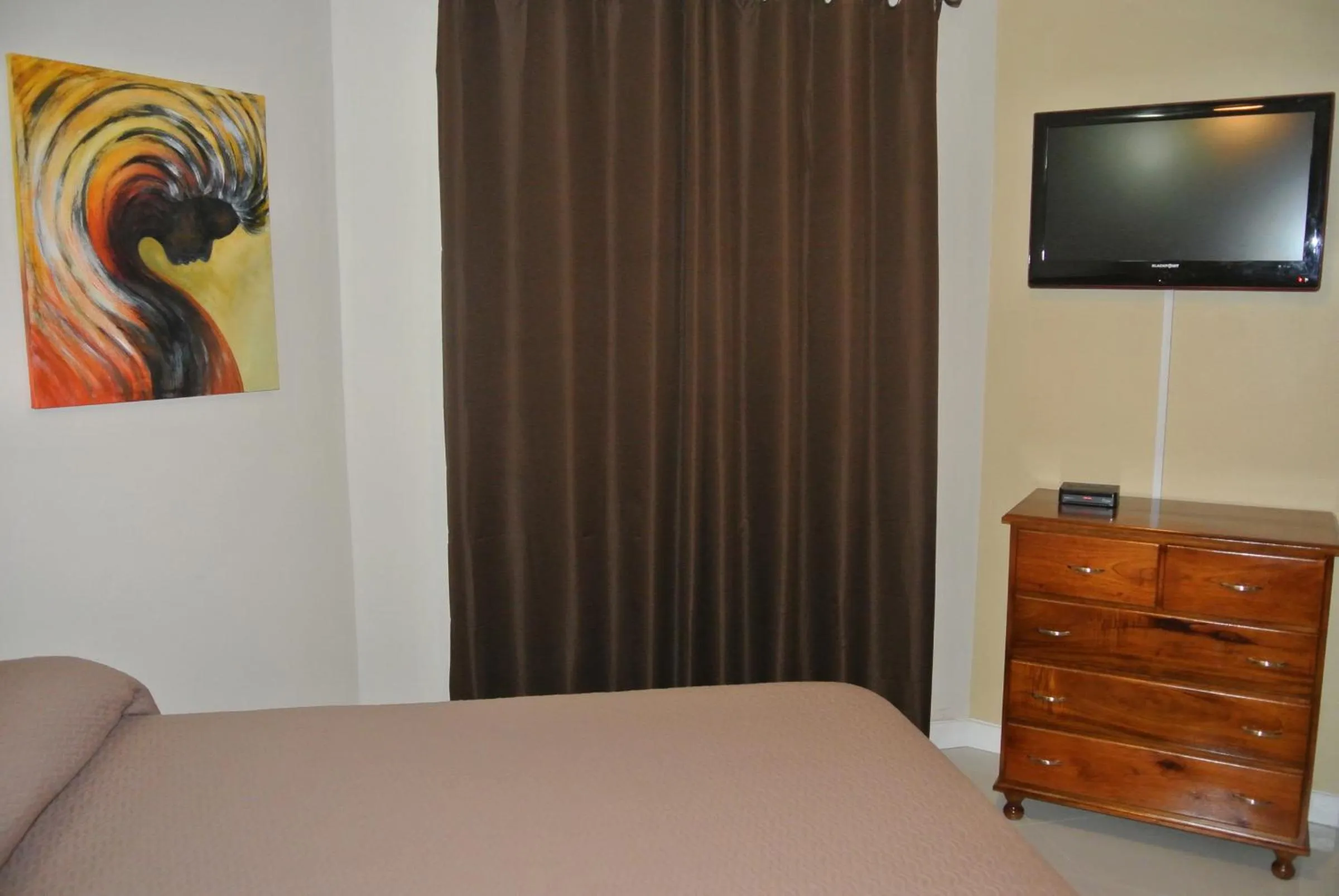 Bedroom, Bed in Beach One Bedroom Suite 13