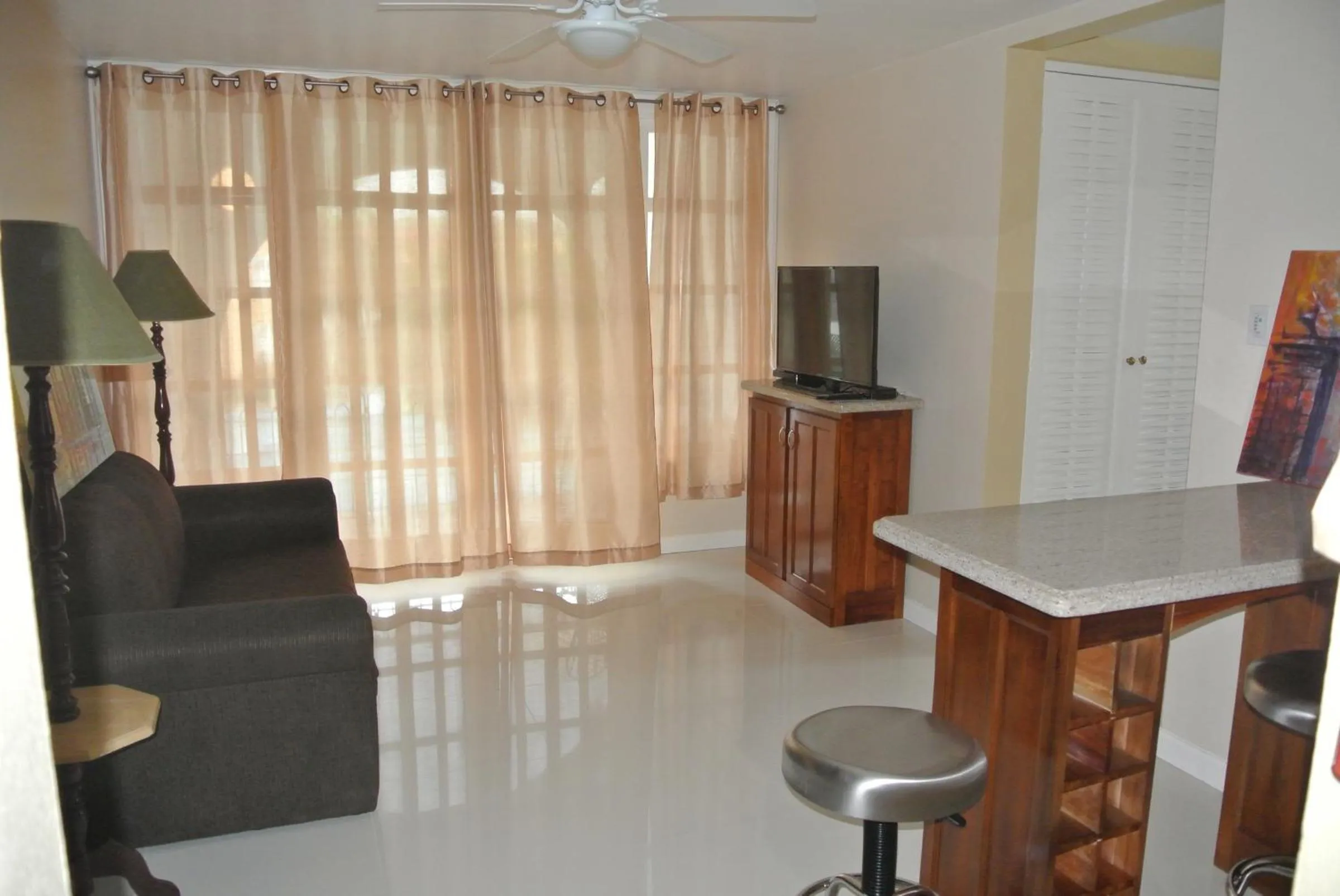 Living room in Beach One Bedroom Suite 13